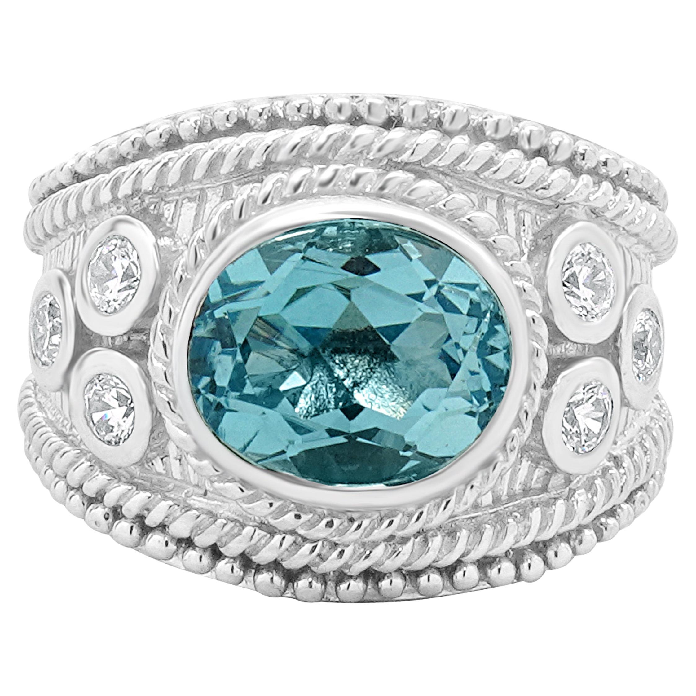 Judtih Ripka Sterling Silver Blue Topaz and CZ Ring