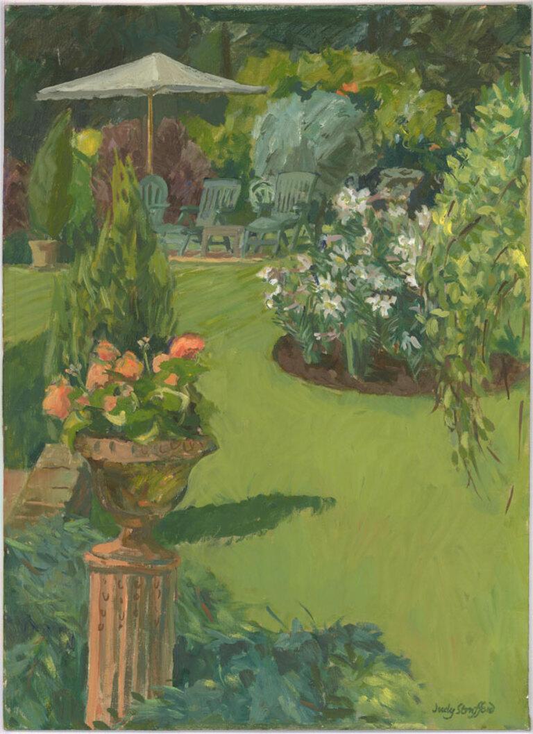 A charming 20th Century garden scene in oil showing a verdant Summer's day in a beautiful garden. The artist has signed to the lower right corner. On canvas laid to board.