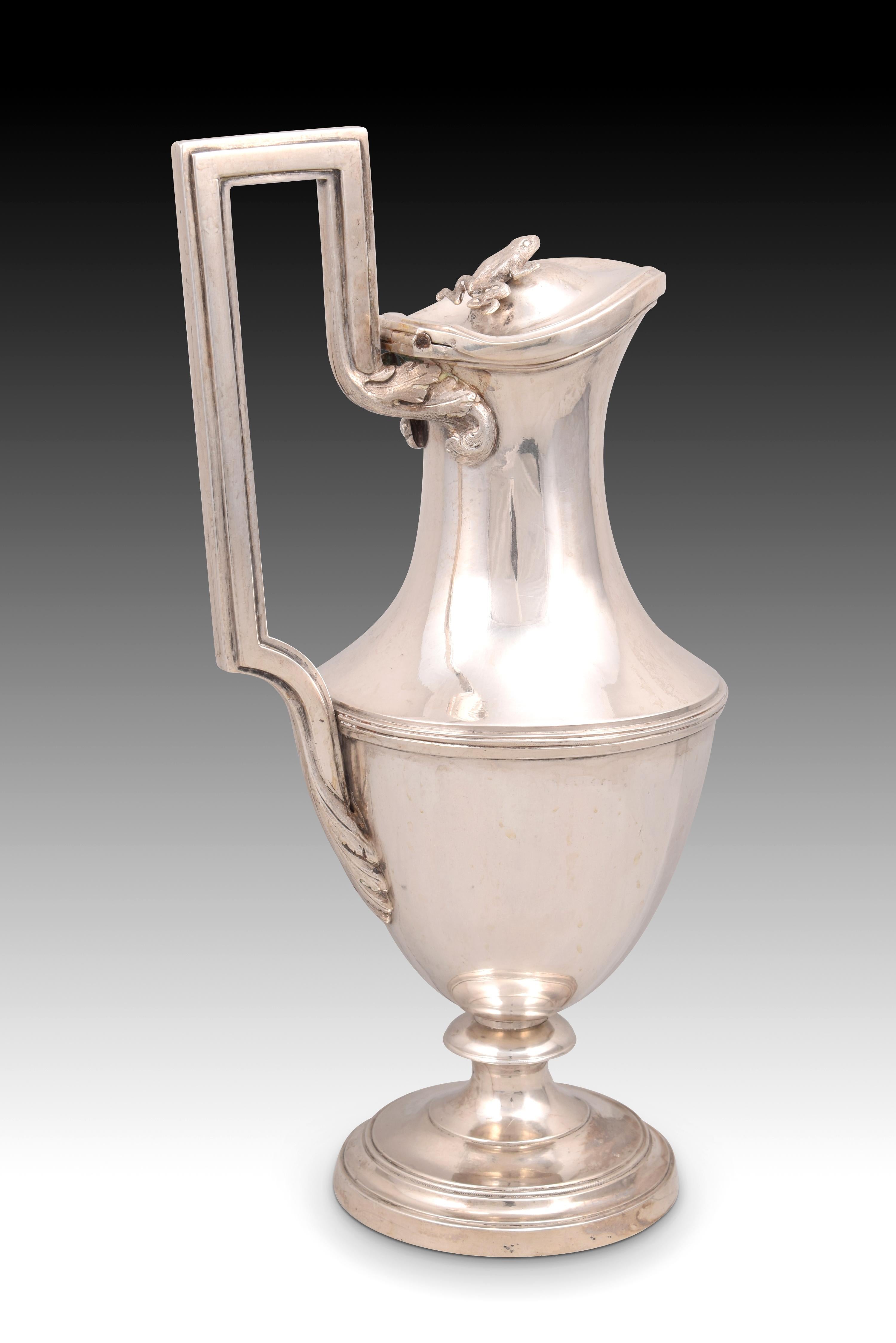 Jug. Silver. Madrid, Spain, 1803. With contrast markings. 
Published Encyclopedia of Spanish and Viceregal American silver. Bibliography: Fernández, Alejandro; Munoa, Raphael; Rabasco, Jorge. 