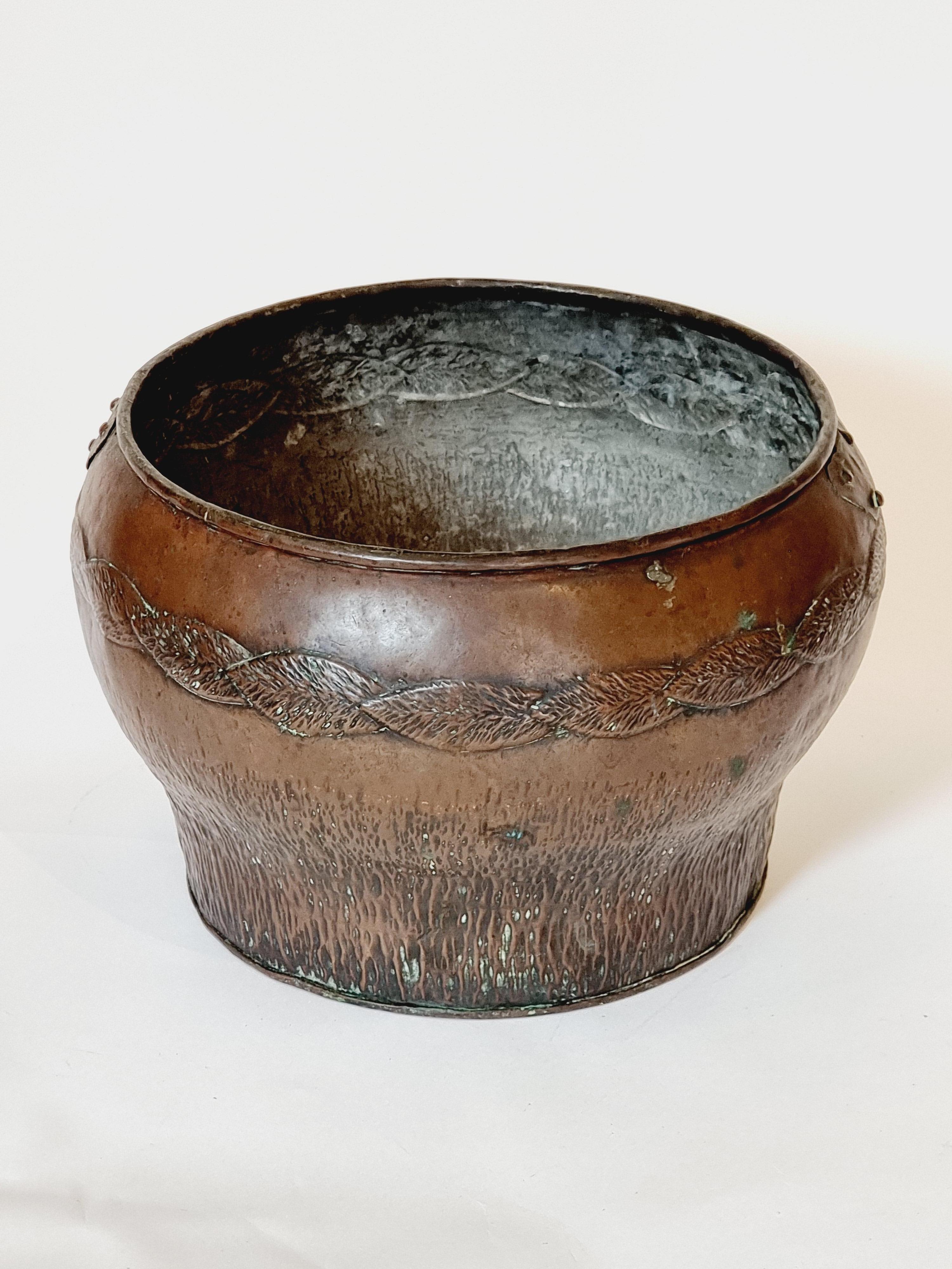 A decorative copper planter made in Sweden during the early 20th Century, Jugend.

Signs of age and wear, recommend planting with an inner pot. 