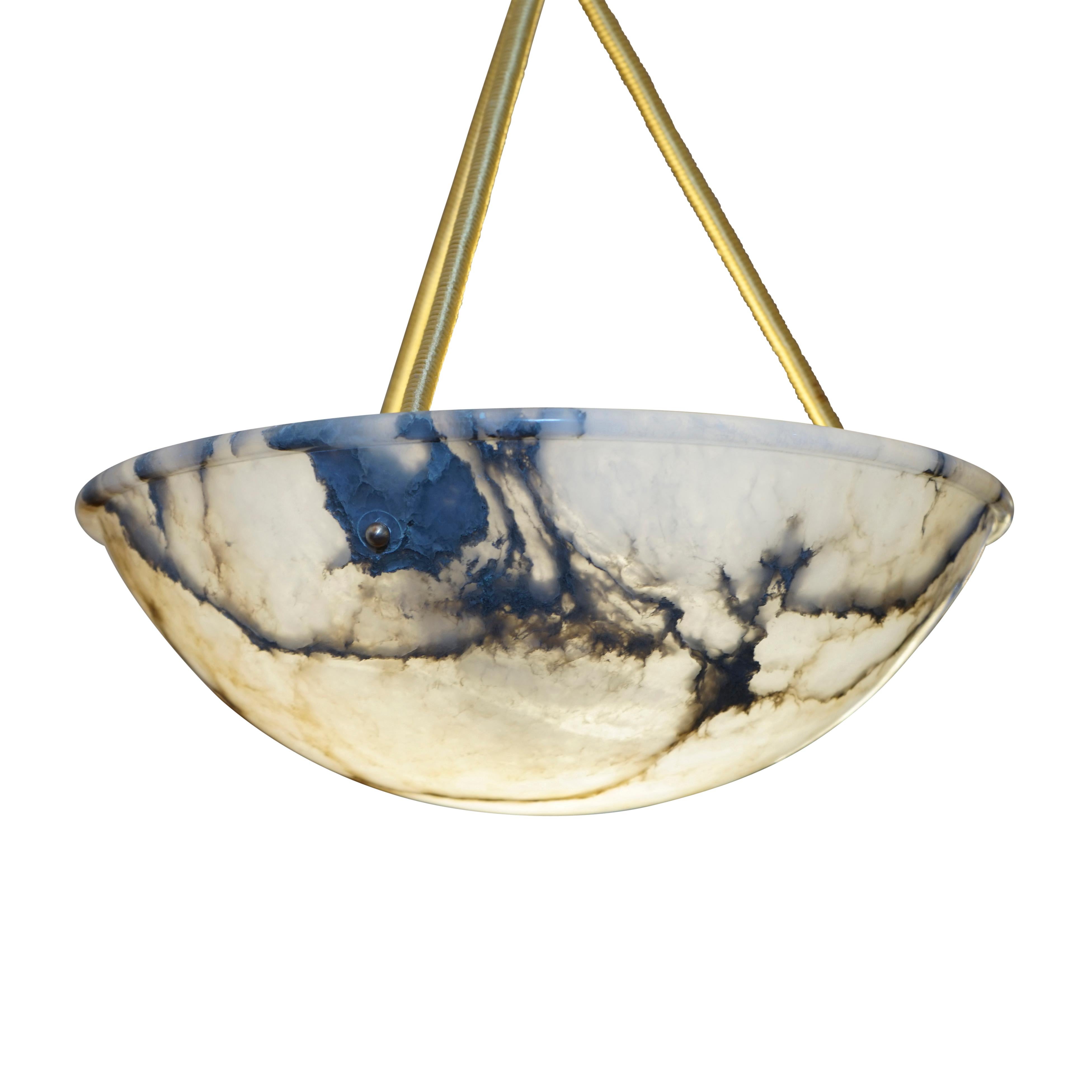 A pure example of a Classic Swedish design with a defined, singular upper rim and brilliant mineral veined alabaster streaked with crystal. This type of lighting was sleek and typified the new century's fascination with the recently perfected use of