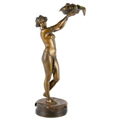 Escultura de bronce austriaca Jugendstil Mujer oriental con cuenco de Franz Bergmann
