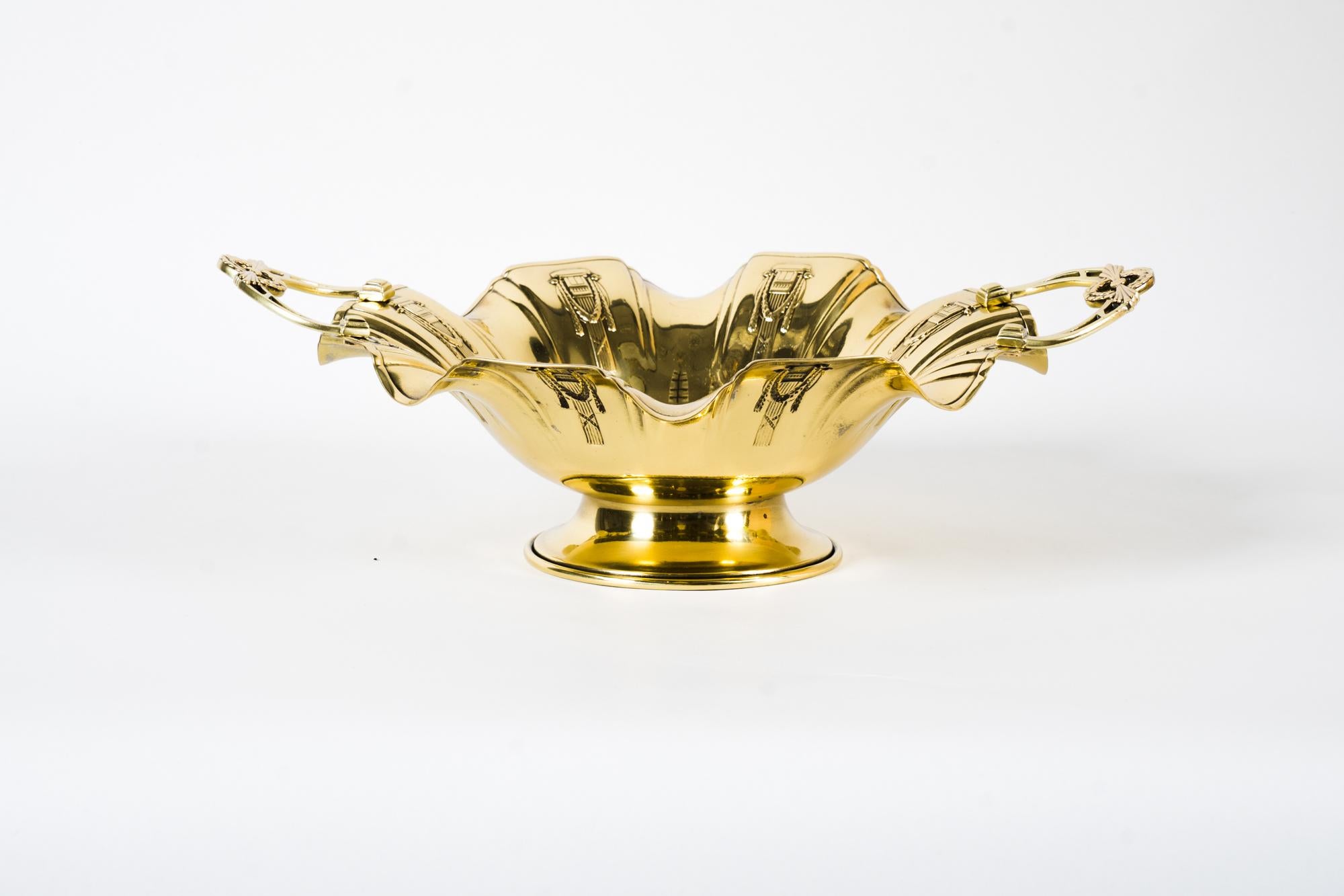 Jugendstil brass centerpiece, around 1908s
Polished and stove enameled.