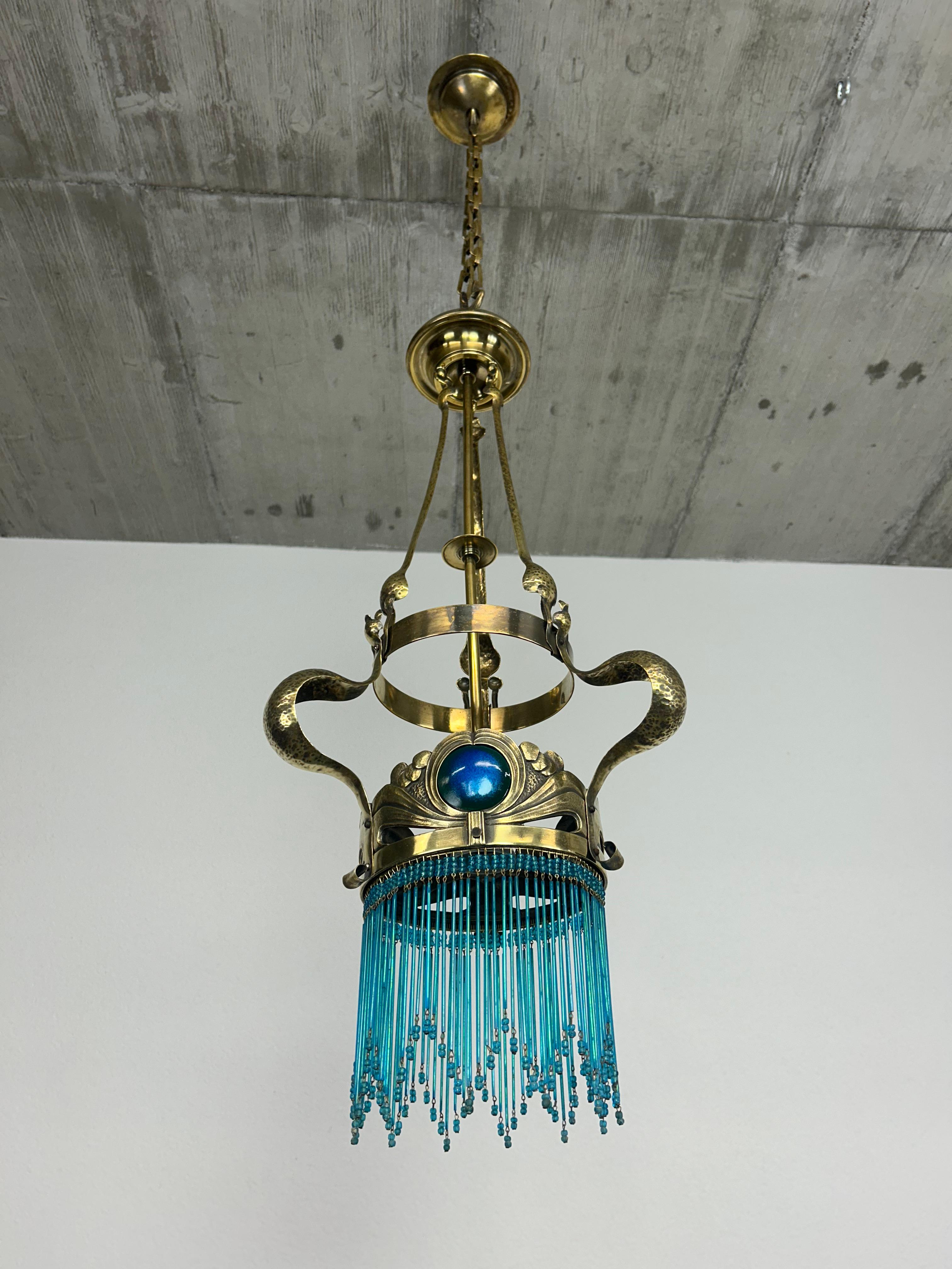 Jugendstil brass chandelier by Koloman Moser in excellent condition.