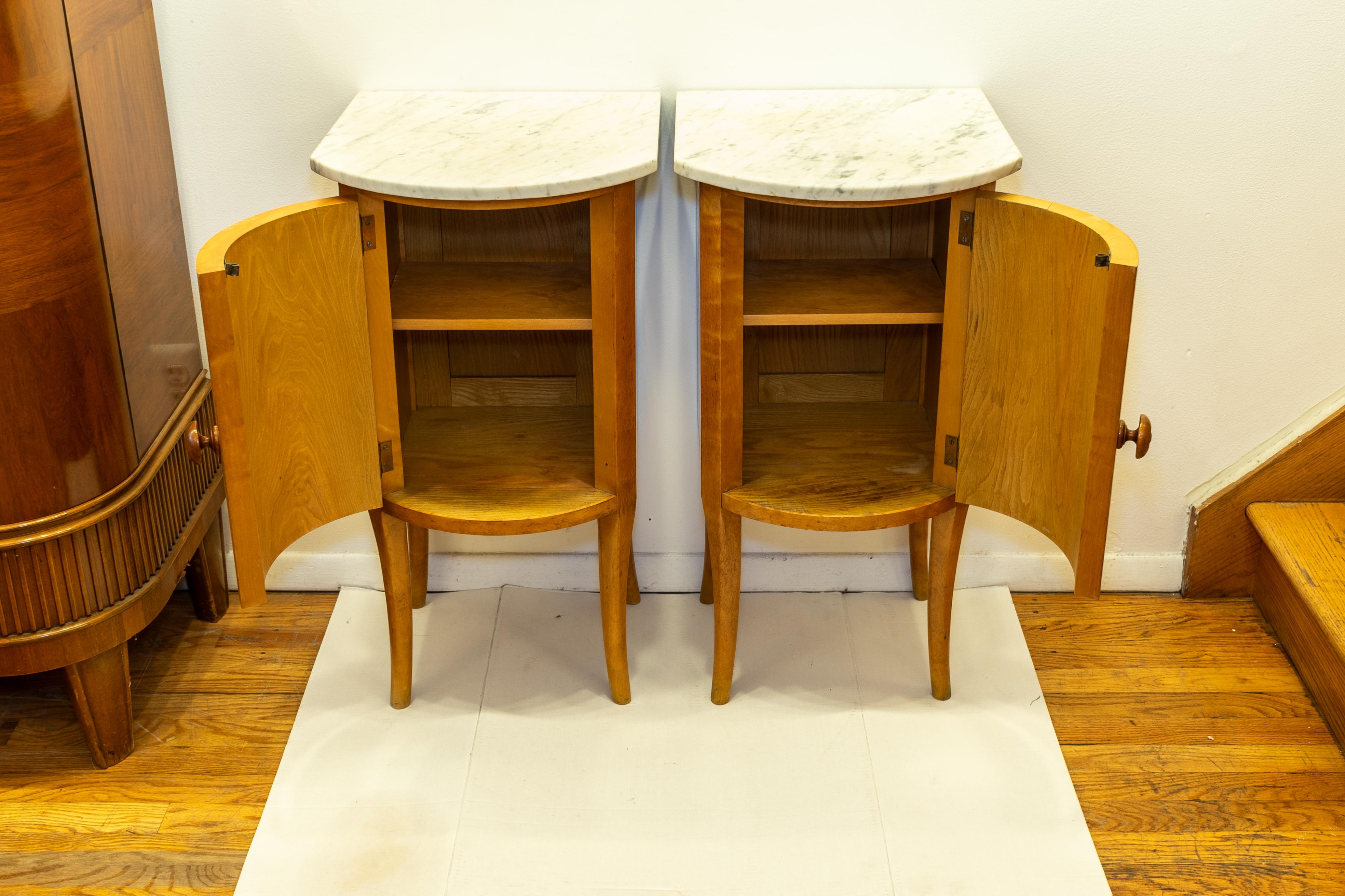 Burlwood veneers adorn all facing sides of this lovely pair of nightstands. Interior storage is ample and construction is rock solid. Topped by nicely figured marble.

Marble tops are removable and may easily be replaced.
