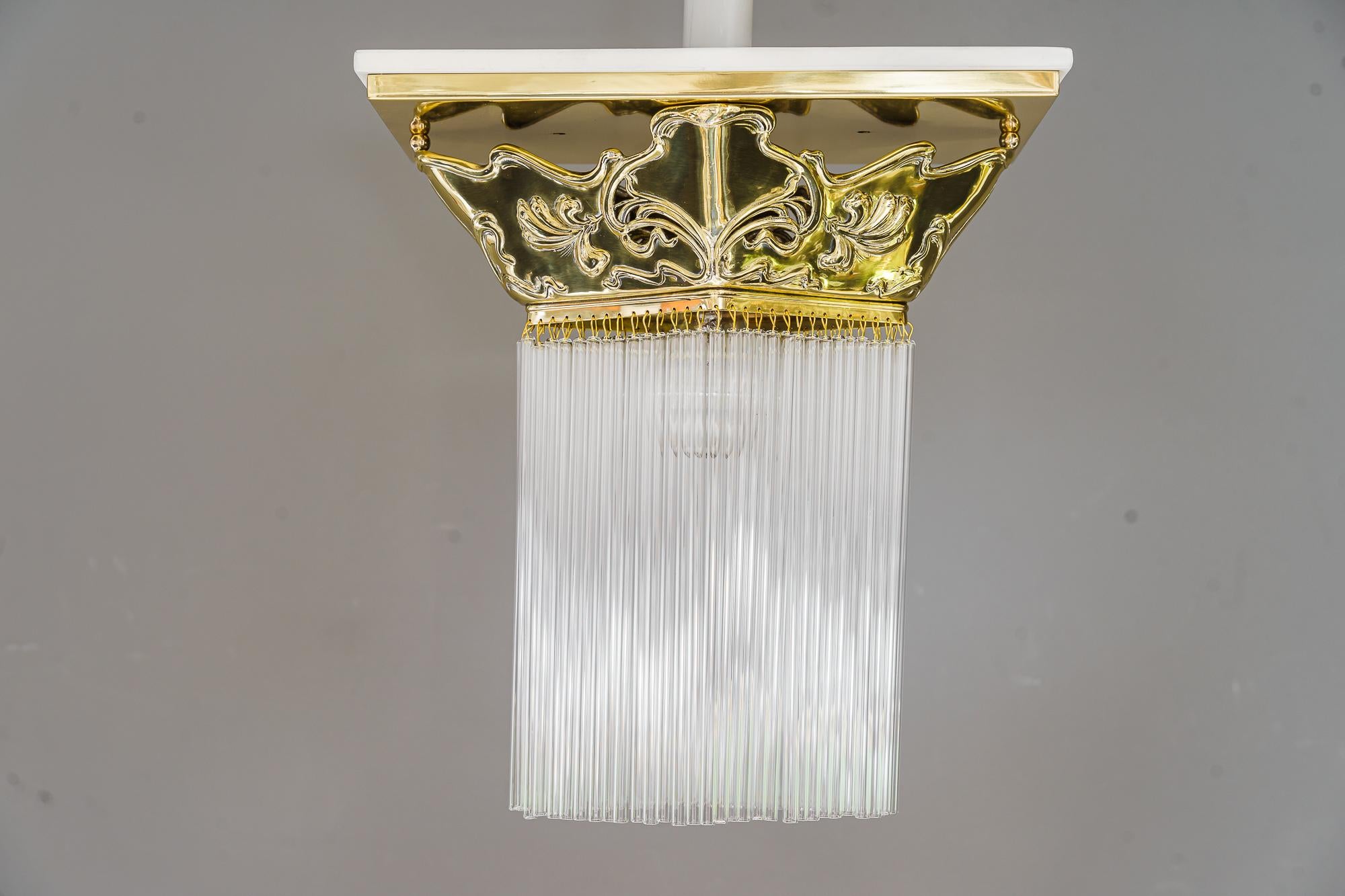 Jugendstil ceiling lamp vienna around 1908 ( floral )
Brass polished and stove enameled
The glass sticks are replaced ( new )
Wood white painted on top.