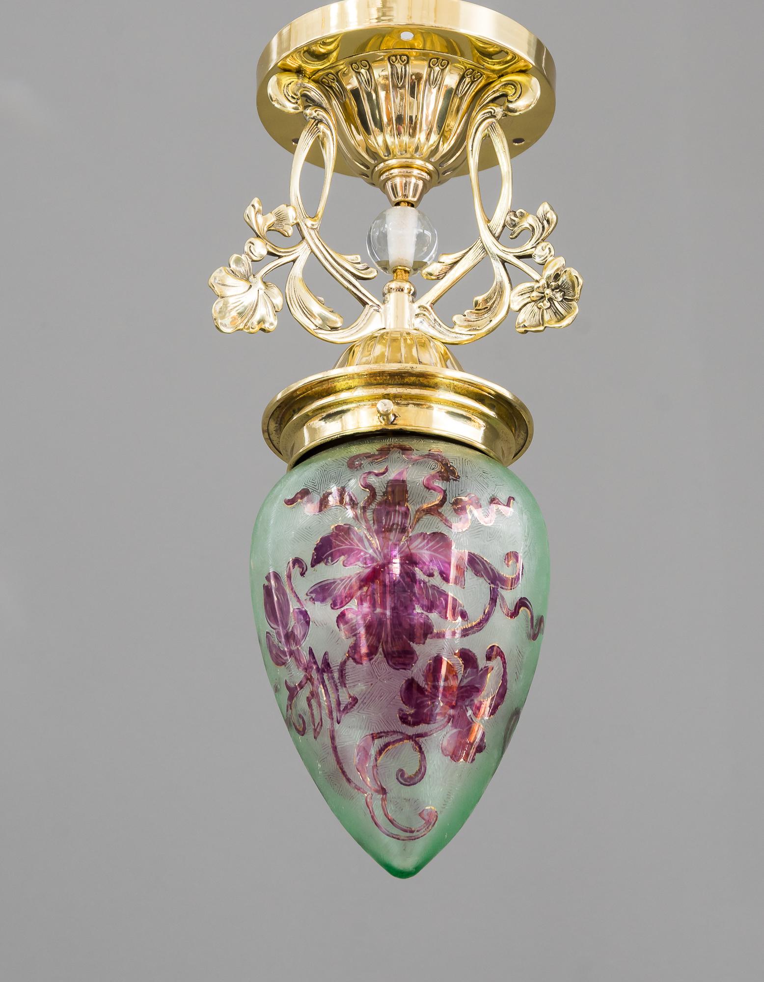 Jugendstil ceiling lamp with beautiful shade, circa 1903 
Polished and stove enameled
Original glass shade ( Painted ).
 