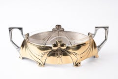 Jugendstil centerpiece mad of alpaca and brass with glass around 1908