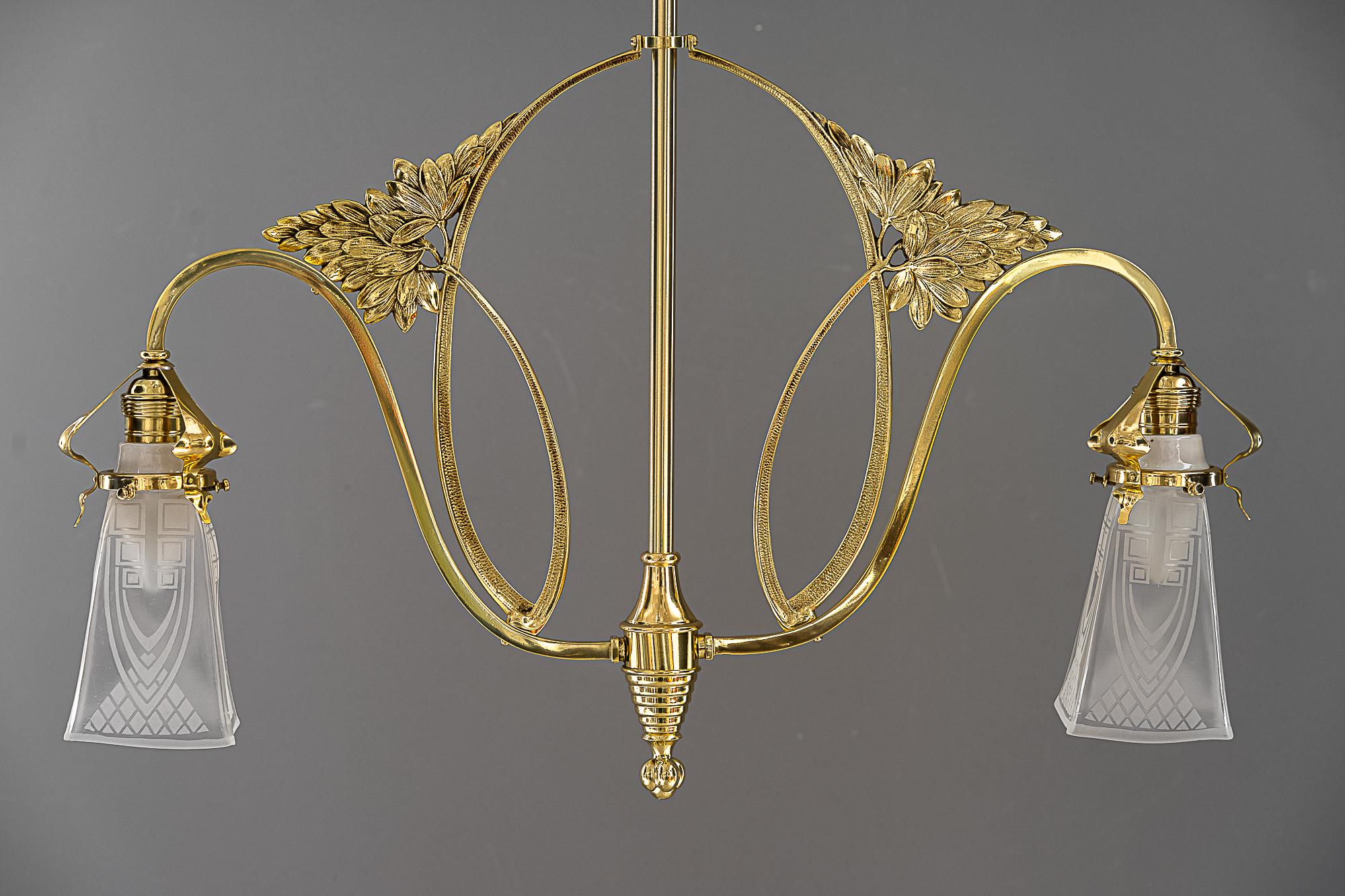 Jugendstil chandelier vienna around 1909
Polished and stove enameled
Original antique glass shades