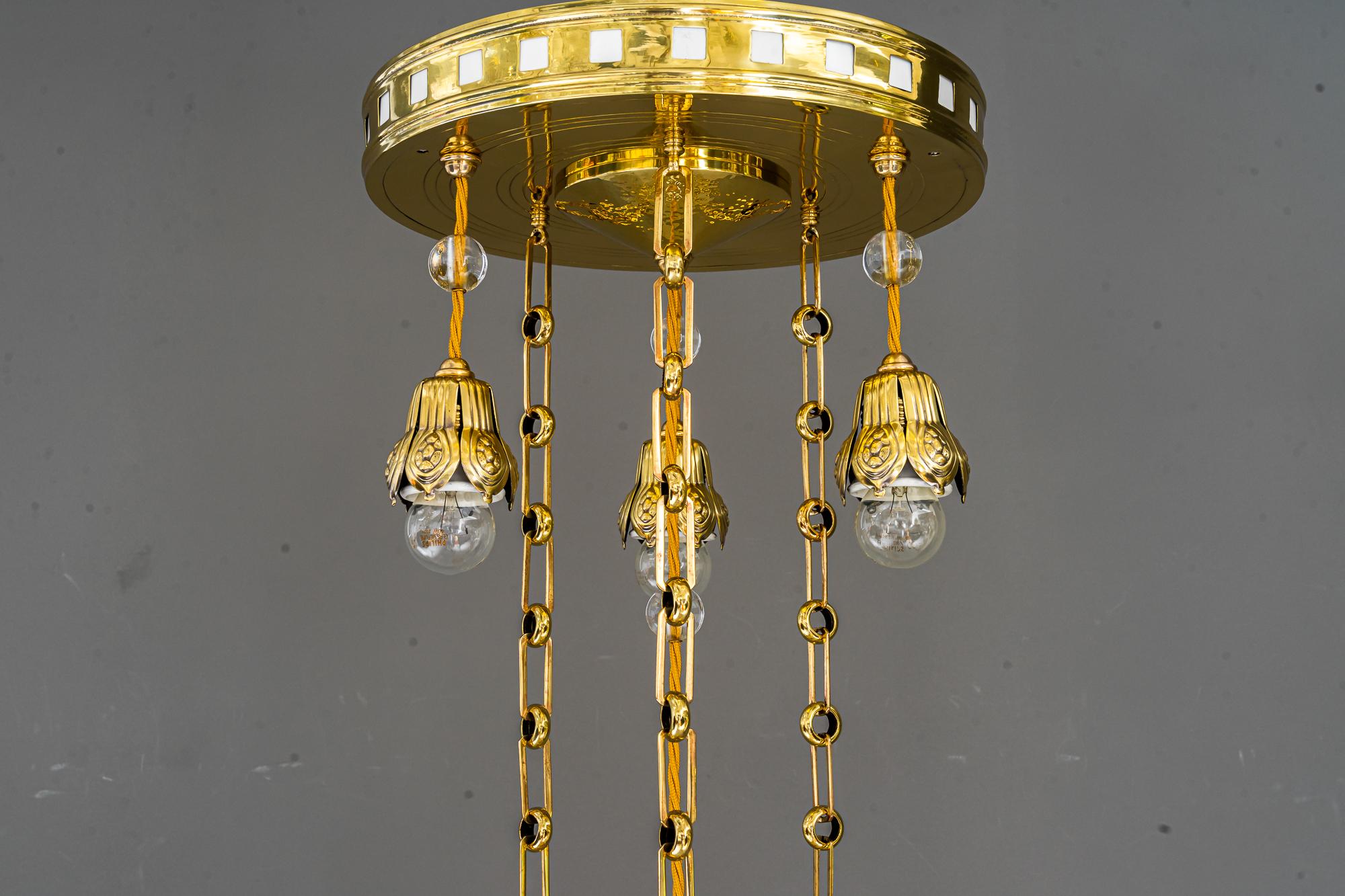 Jugendstil chandelier, Vienna, 1910s.
Polished and stove enameled.
Original high quality glass shade.