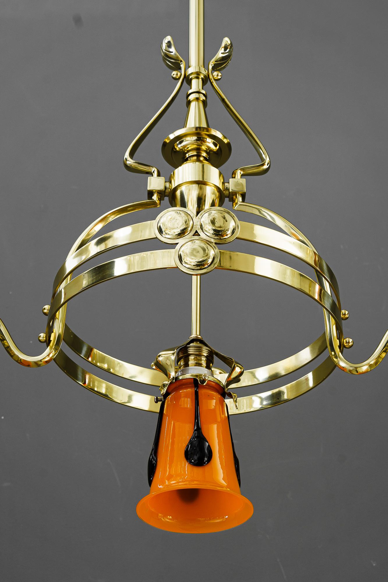 Brass Jugendstil chandelier with loetz glass shades vienna around 1910 For Sale