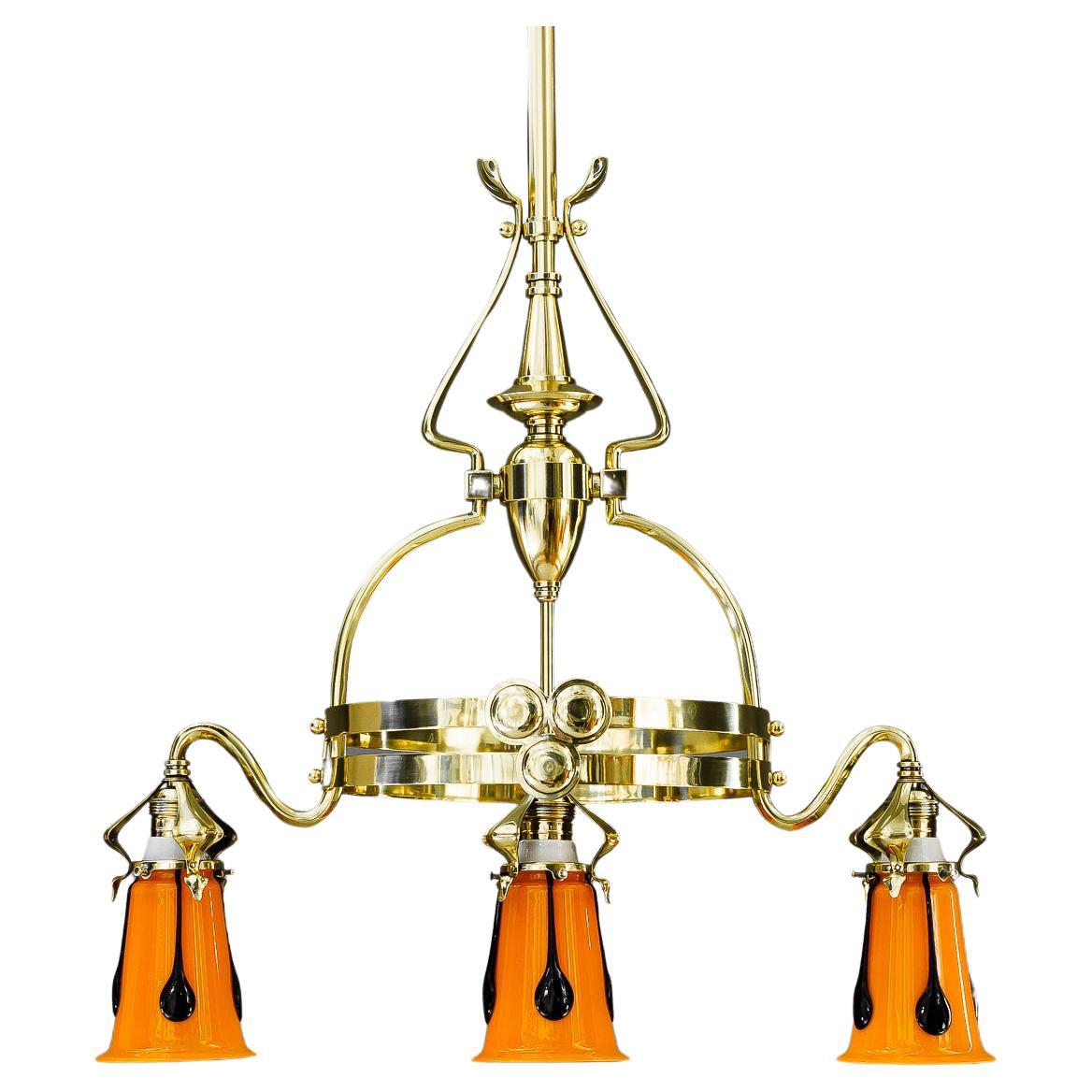 Jugendstil chandelier with loetz glass shades vienna around 1910