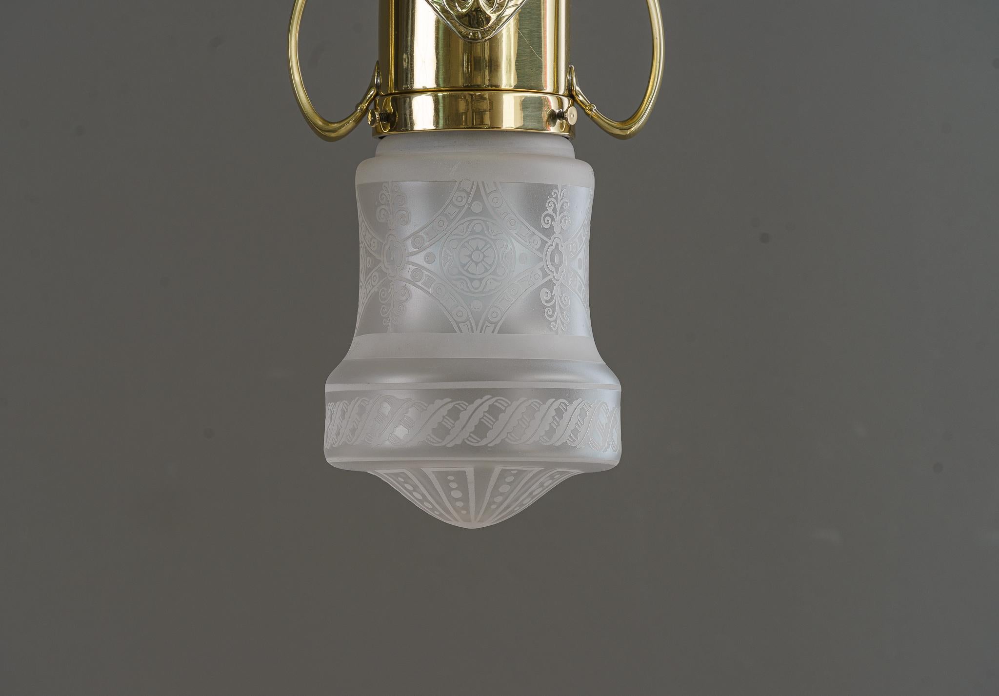 Jugendstil flush mount with original glass shade Vienna around 1910
Brass polished and stove enameled.
Original glass shade.