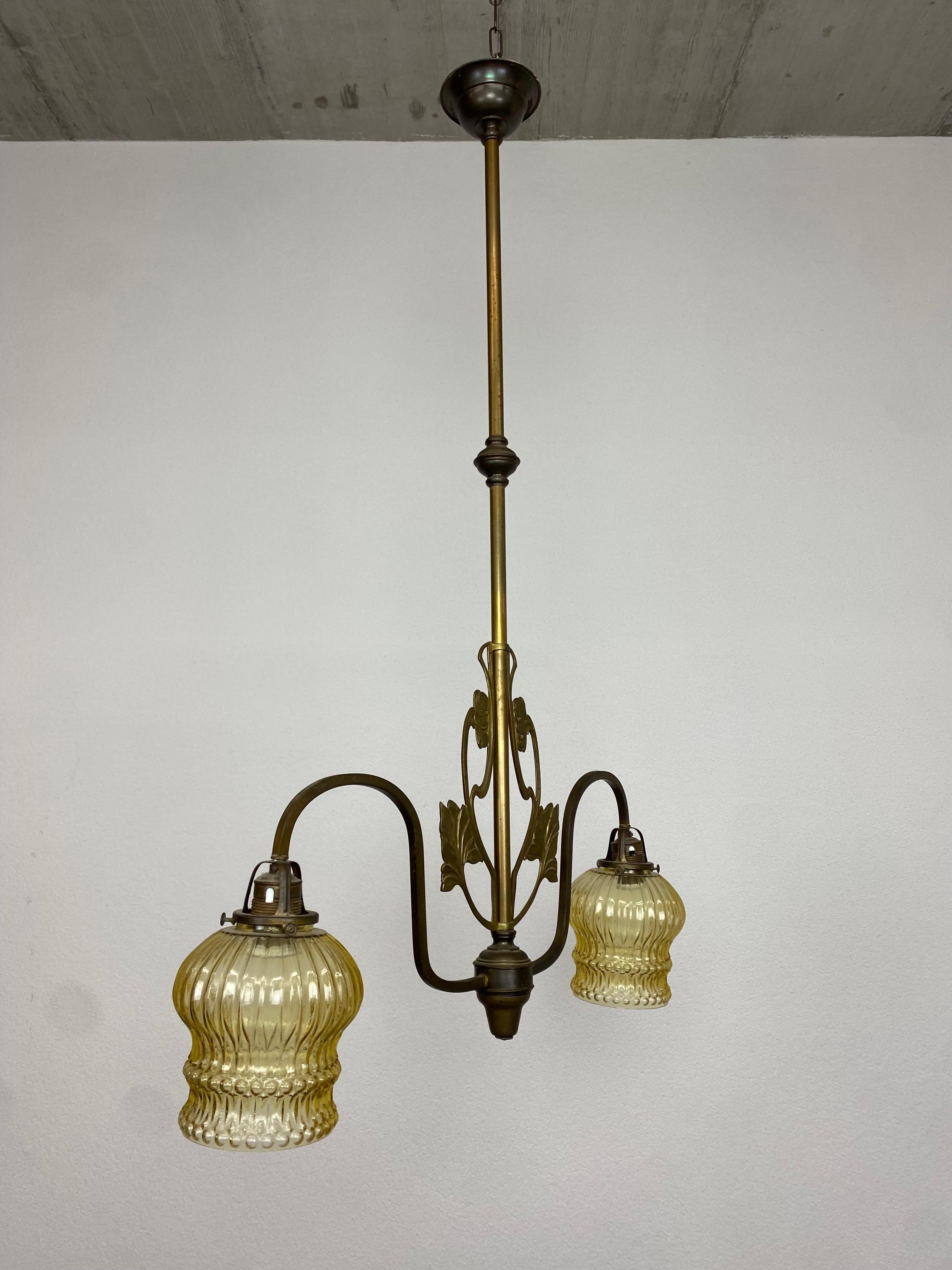 Brass jugendstil hanging lamp. Wear consistent with age and use.