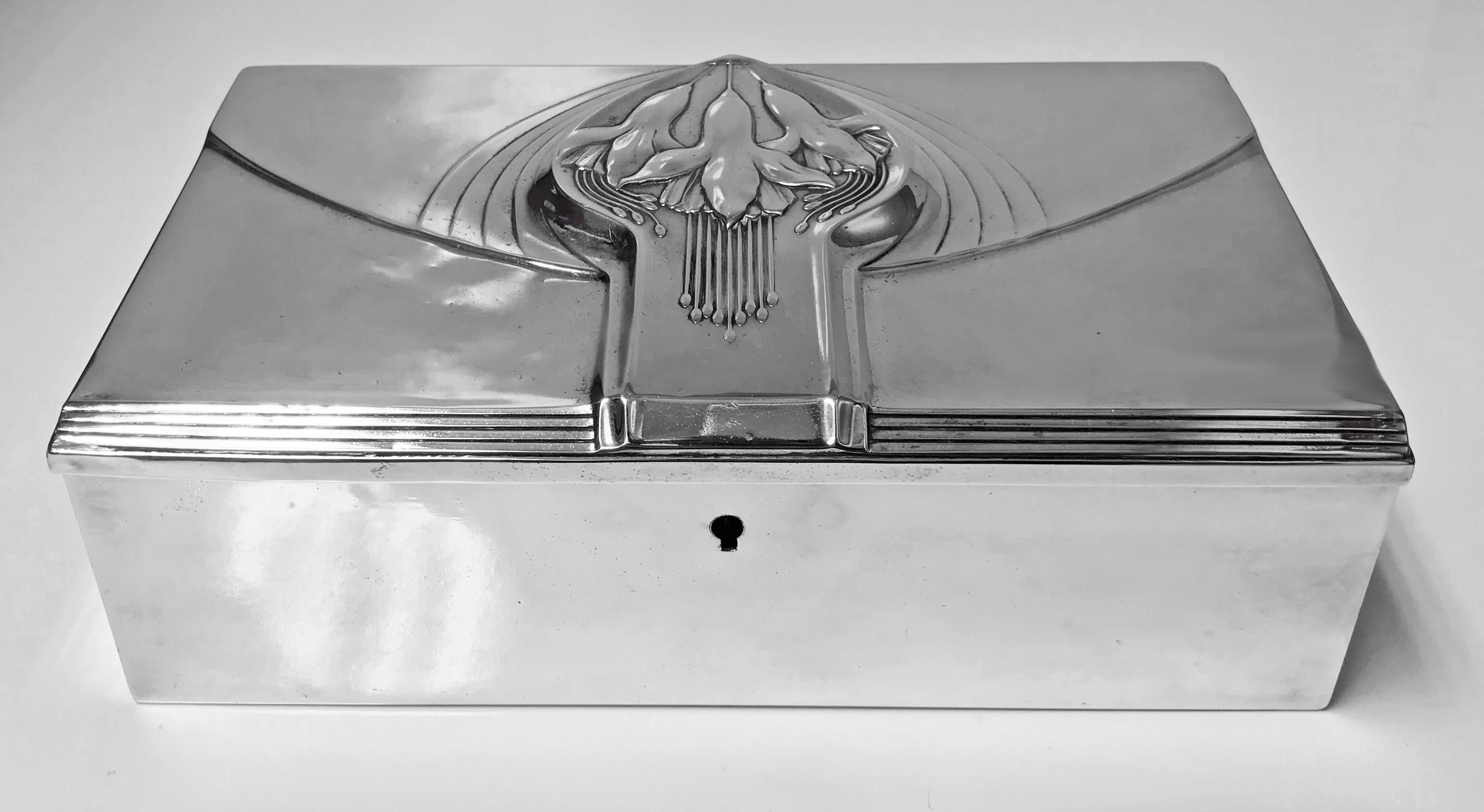 Jugendstil Nouveau Secessionist Silver plate Jewellery Box, WMF Germany C.1906. The large rectangular box with stylised raised foliate hinged cover, plain sides. Satin silk lined interior. WMF marks on underside. Measures: 8.75 x 5.50 x 2.50 inches.