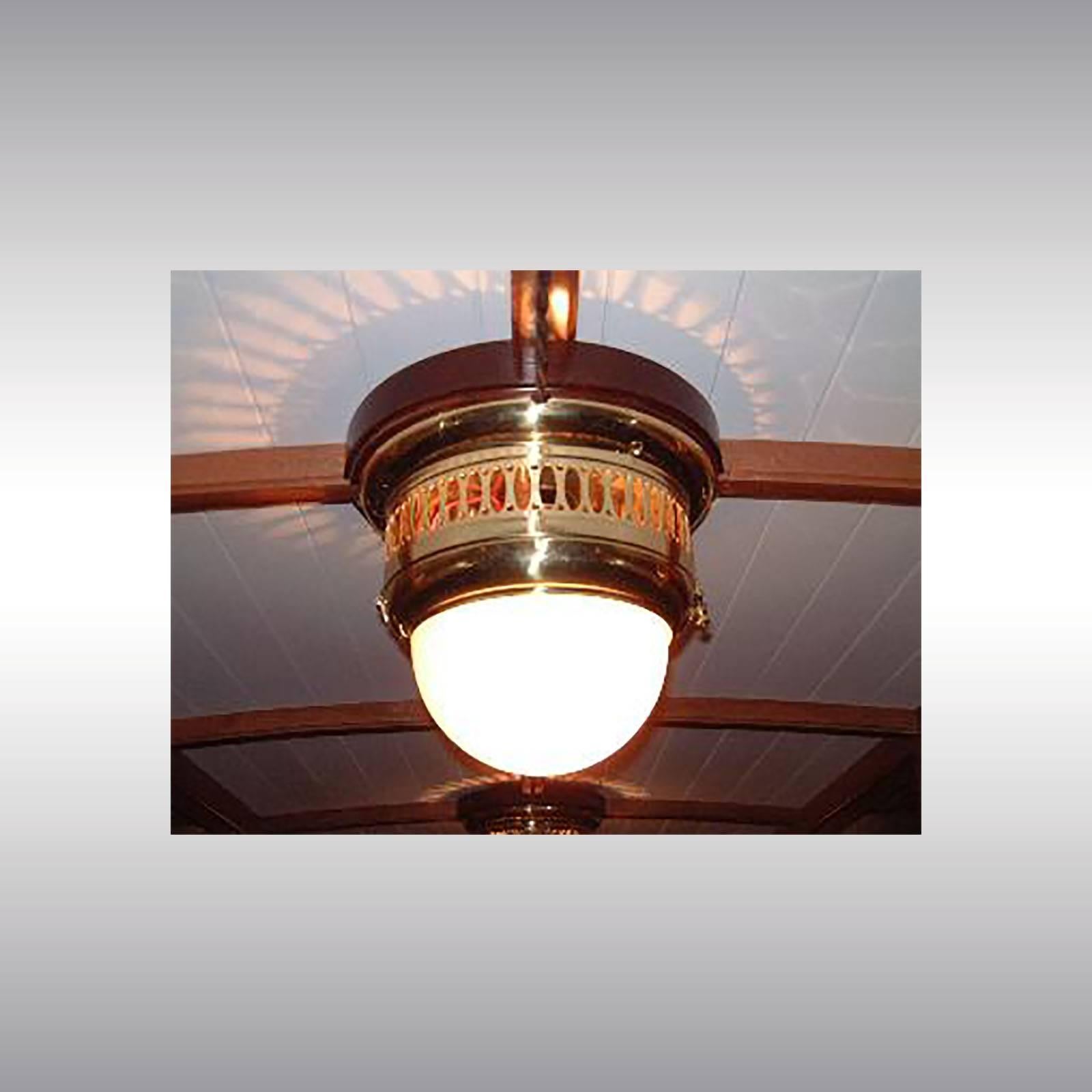 Wall or ceiling light with opaline glass, pictured in brass, designed for the viennese tram/streetcar
Brass, optionally varnished or nickel-plated, all other surfaces on request, opaline-glass, hand blown
ll components according to the UL