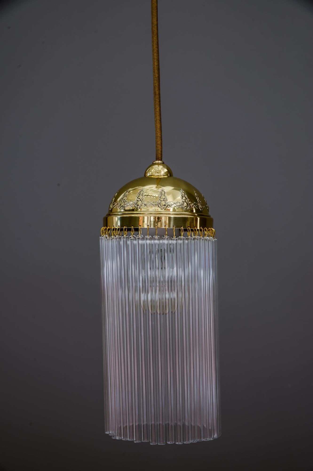 Jugendstil pendant circa 1908 with glass sticks
Polished and stove enameled
Glass sticks are replaced (new)
We can change the height for other room height.
