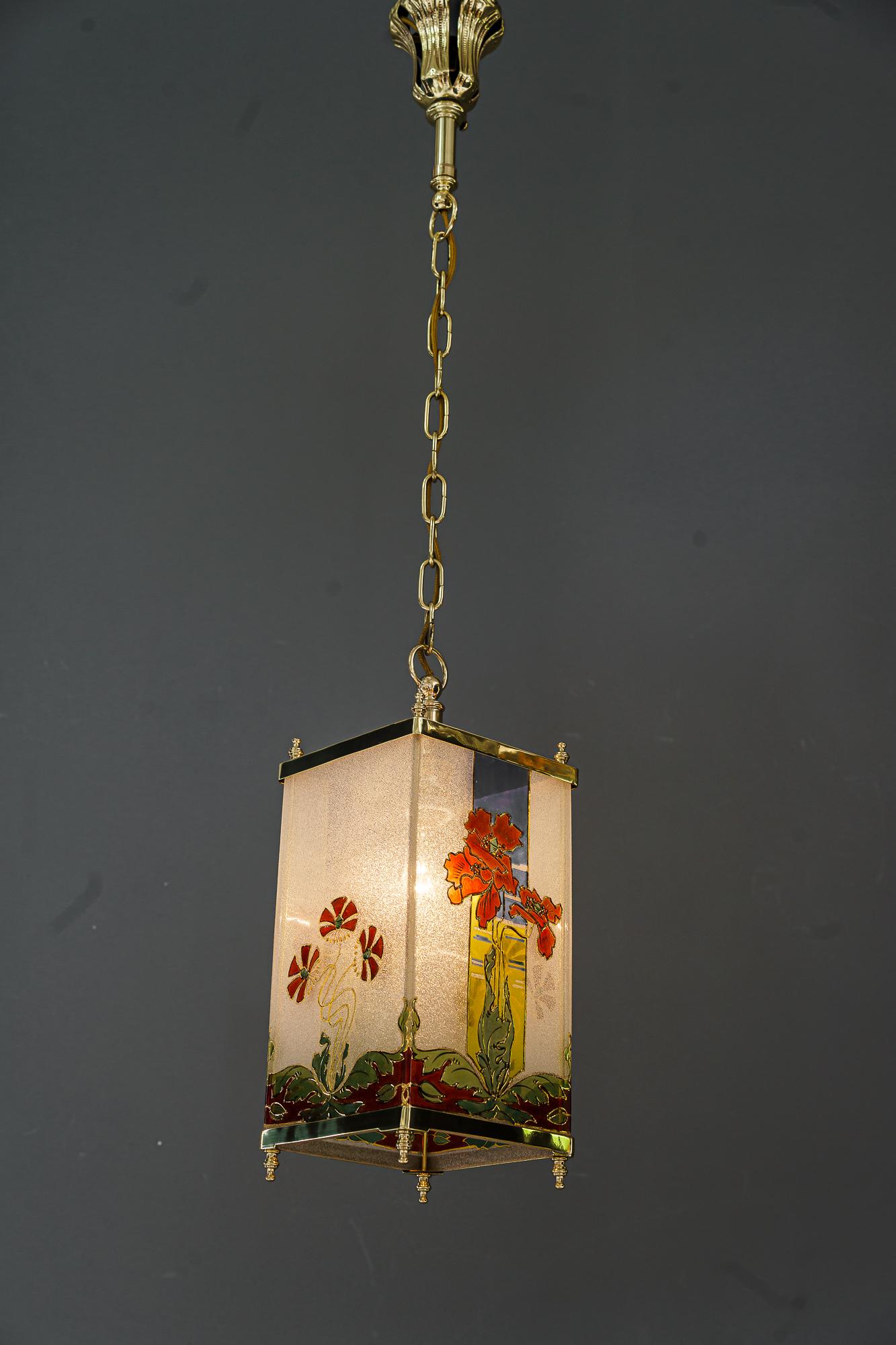 Jugendstil pendant vienna around 1903
Brass polished and stove enameled
Original antique glass (painted).