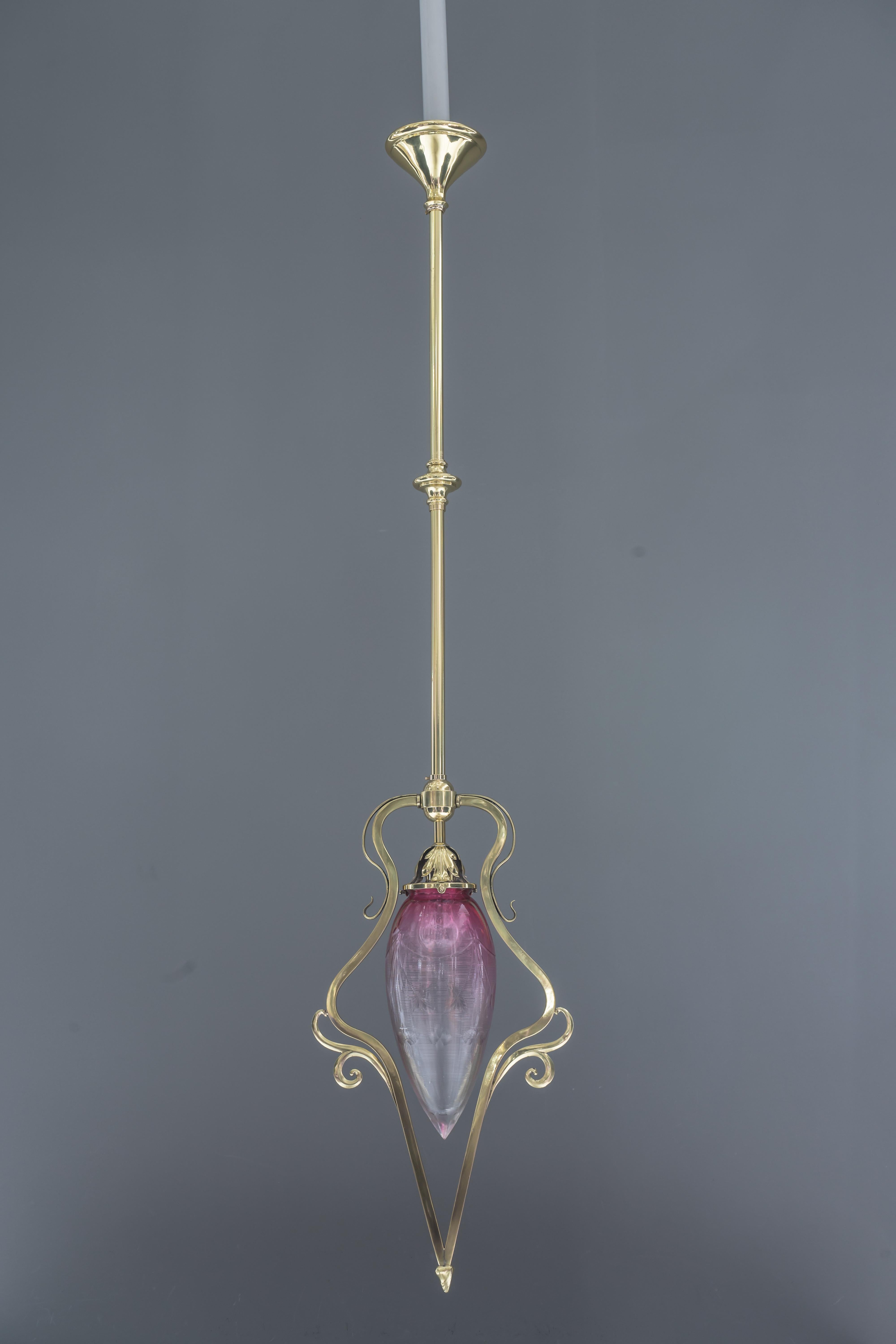 Jugendstil pendant Vienna circa 1907 with original cut glass
Brass polished and stove enameled.