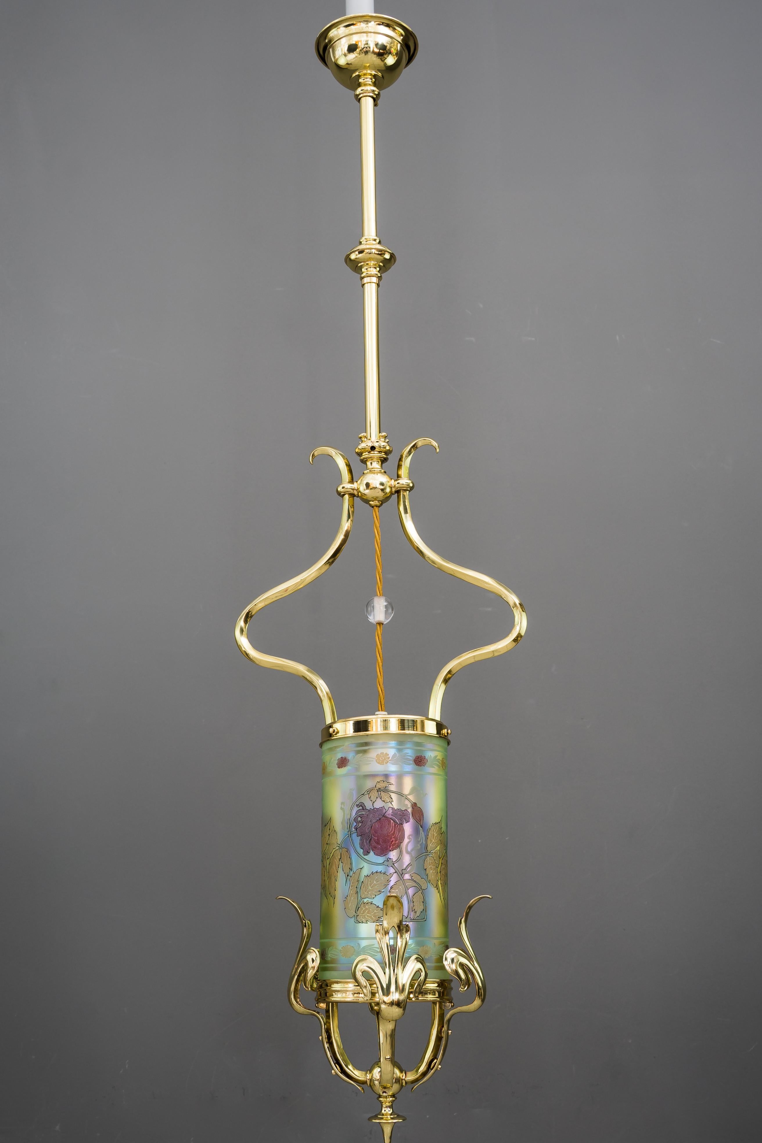 Jugendstil pendant vienna around 1909
Brass polished and stove enamelled
Painted glass shade.