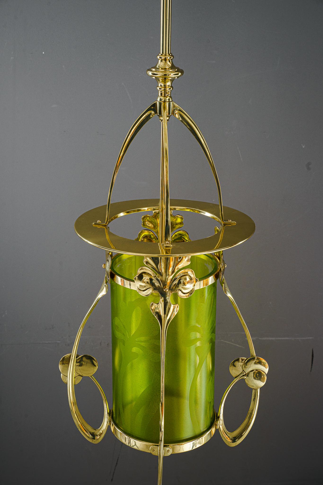 Jugendstil Pendant with hand painted glass shade vienna around 1908
Brass polished and stove enameled
Original glass shade