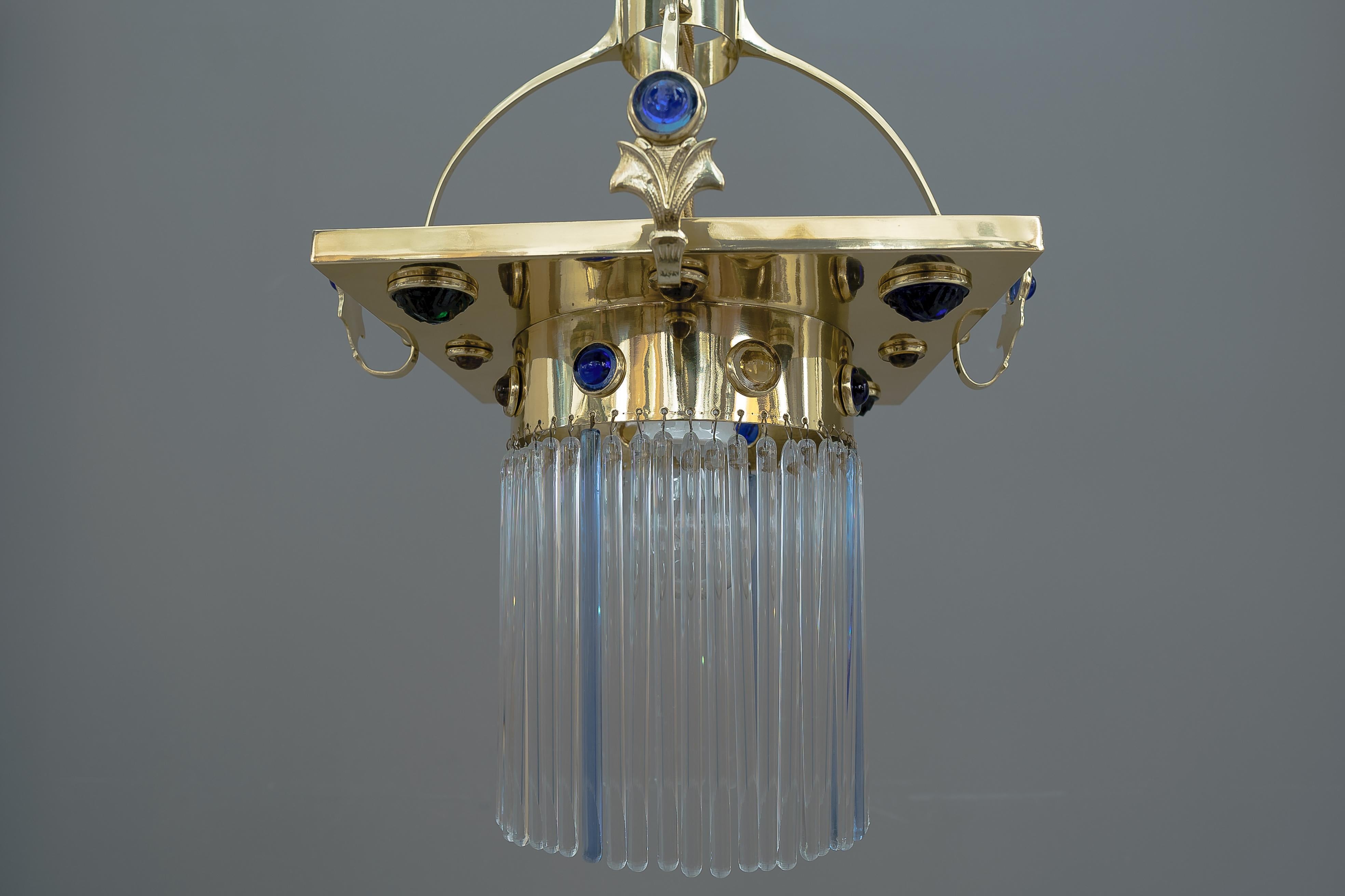 Jugendstil pendant with opaline glass stones and solid glass sticks, Vienna, 1908
Original glass sticks
Polished and stove enameled.