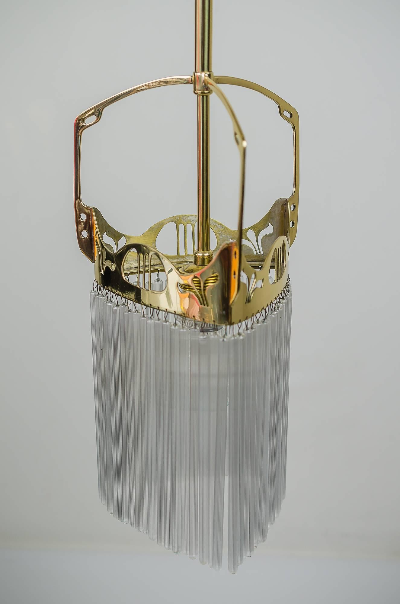 Jugendstil pendant with original glass sticks, circa 1908.
Polished and stove enamelled.