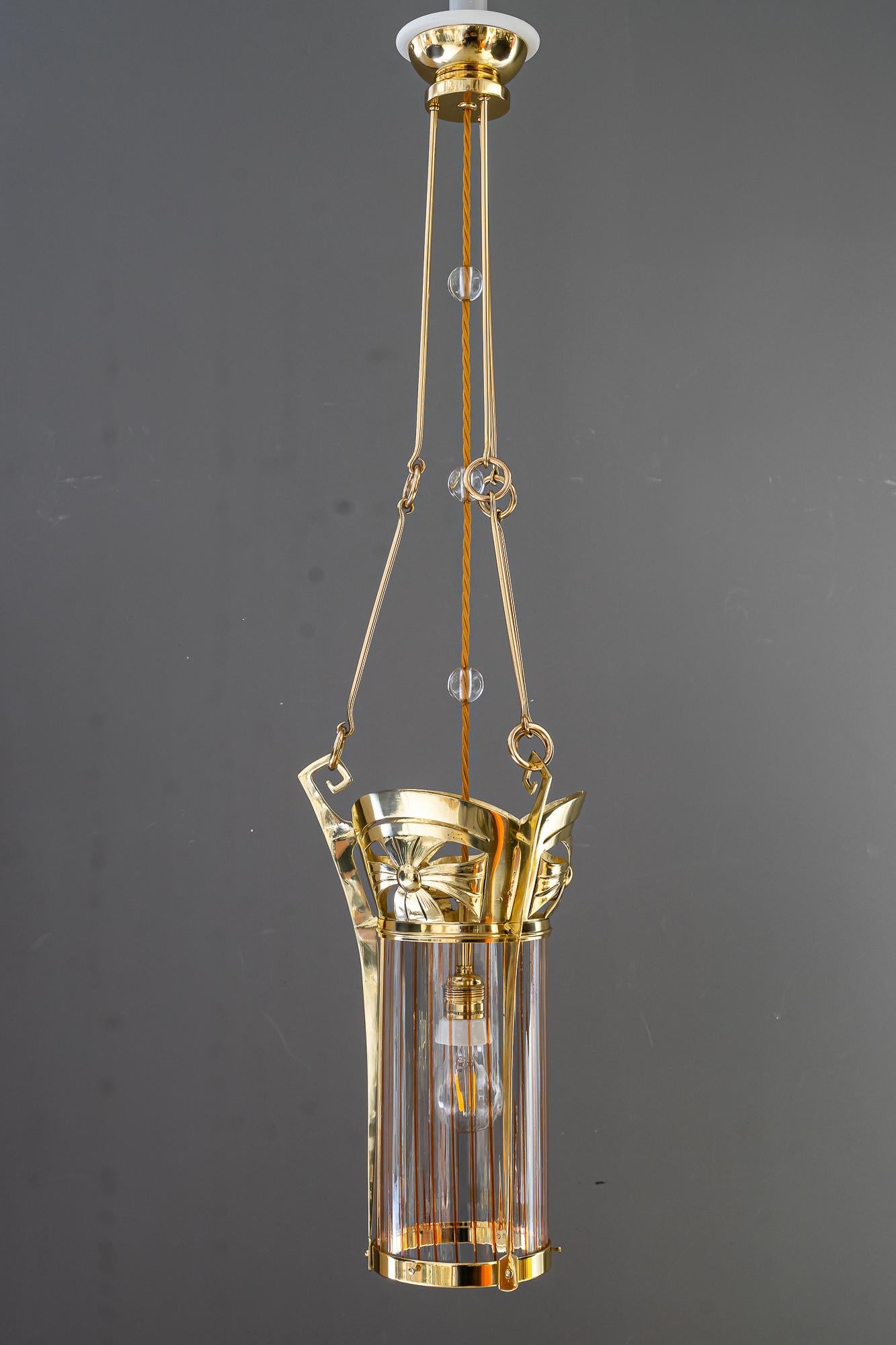 jugendstil pendant with palme koenig opaline glass shade vienna around 1908
Brass polished and stove enameled
The glass is clear glass it is only dark because the background is dark.