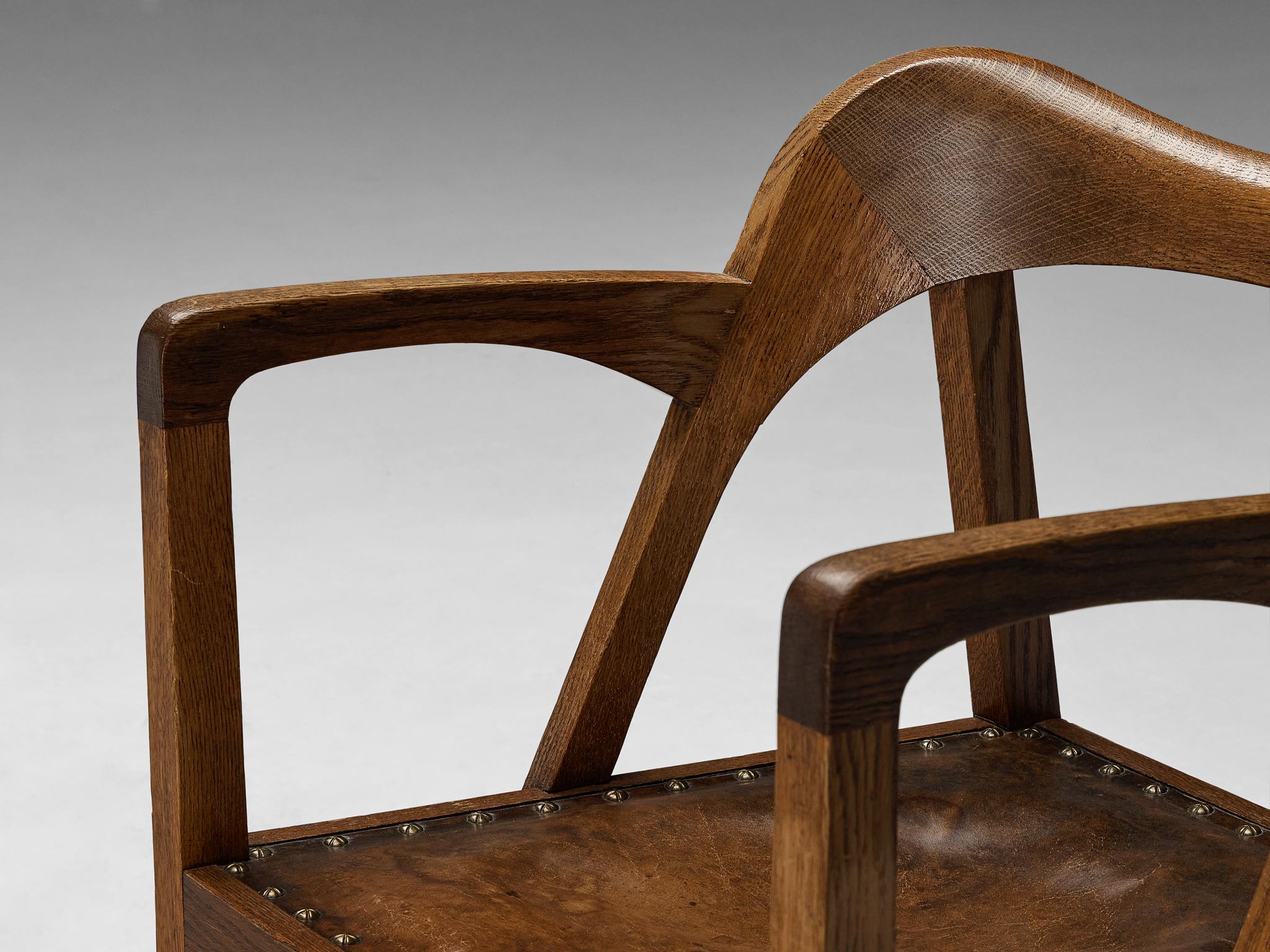 Jugendstil Sculptural Armchair in Oak Leather and Brass 1900-1910 In Good Condition For Sale In Waalwijk, NL
