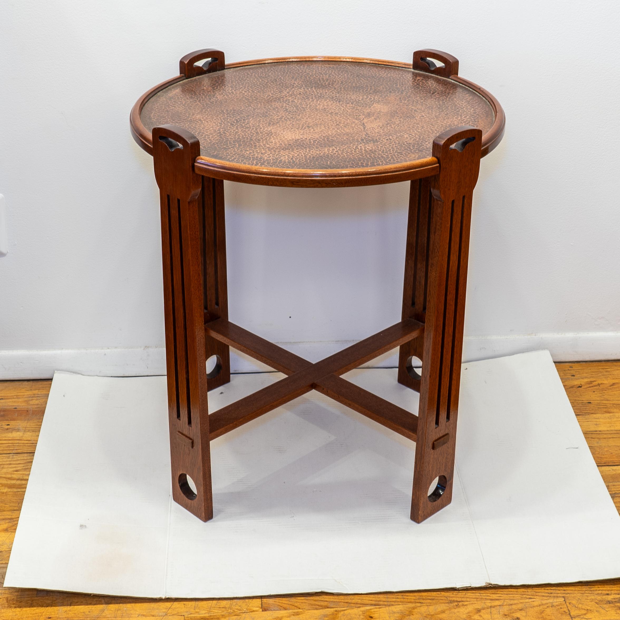 This beautiful table may be used daily, and is solid and durable thanks to its hammered copper surface and solid joinery. Clearly influenced by Charles Rennie Mackintosh, this table produced on the west coast of Sweden shows the cultural connection
