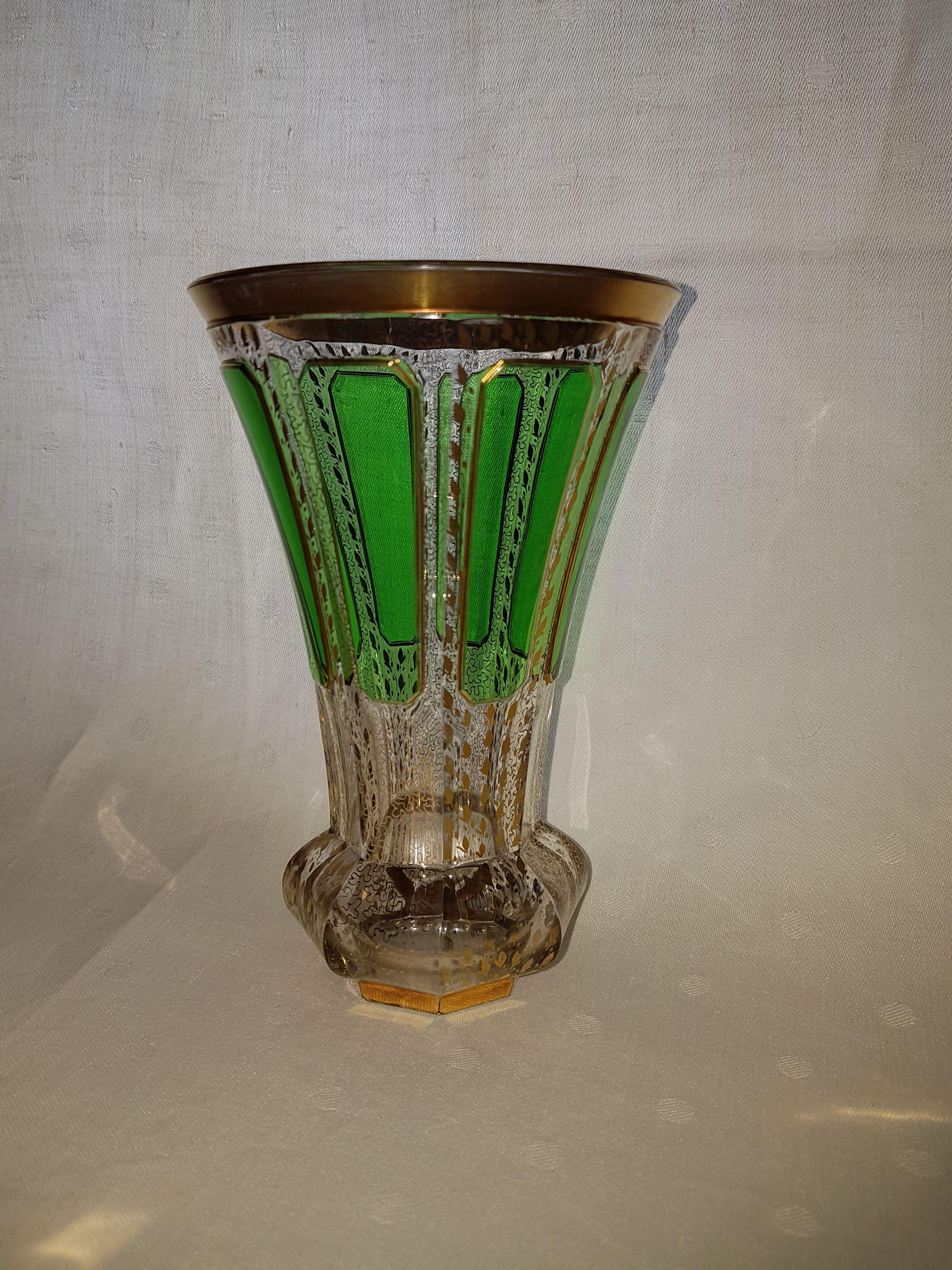 Exquisite Jugendstil stained glass vase with gold applications, made in Austria, circa 1910.
Height 14 cm / 5.51 inches - Diameter  (Top) 9 cm / 3.54 inches
Very charming objet d'art.
