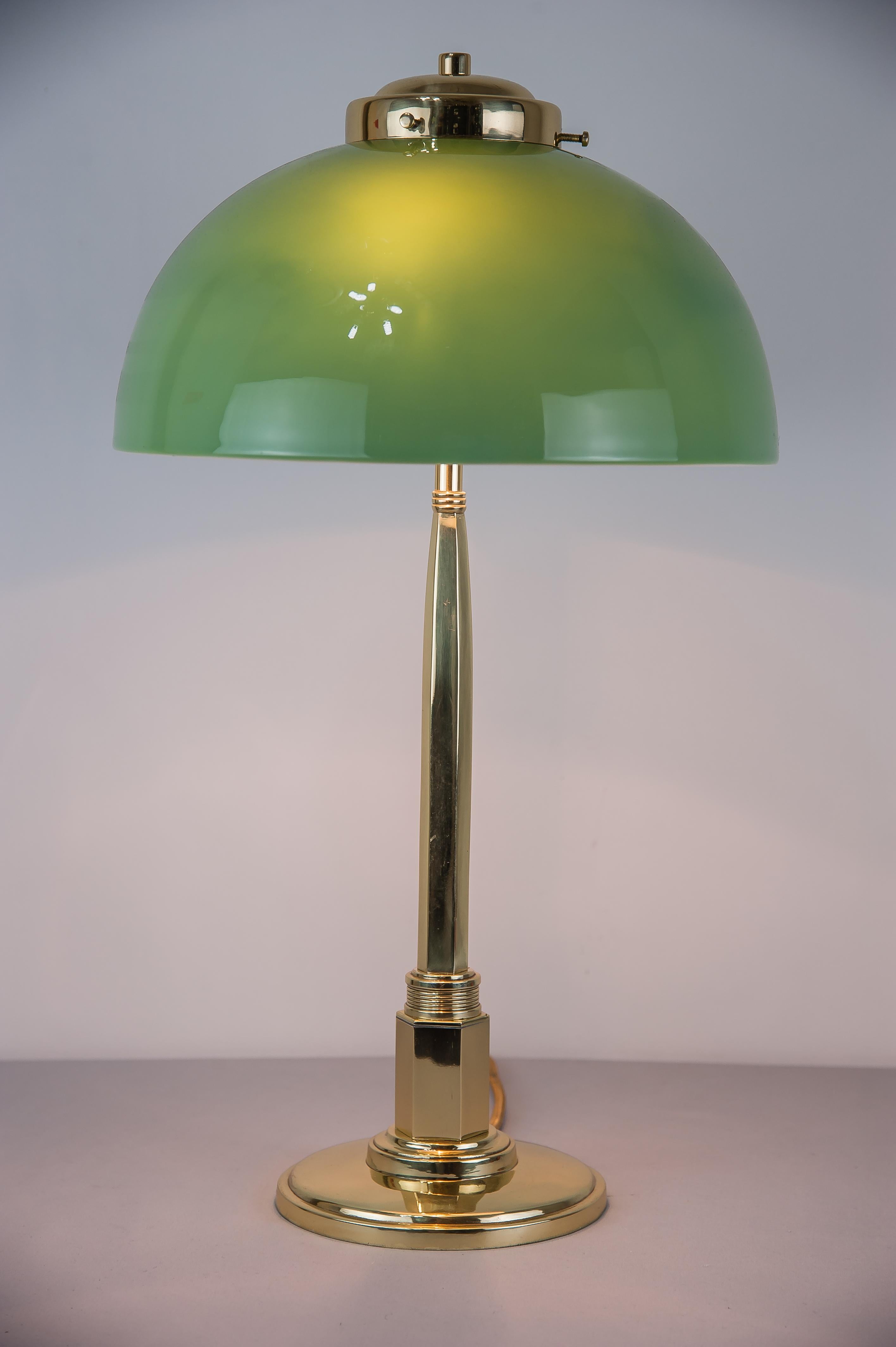 Jugendstil table lamp, 1910s
polished and stove enameled
Original opal glass shade.