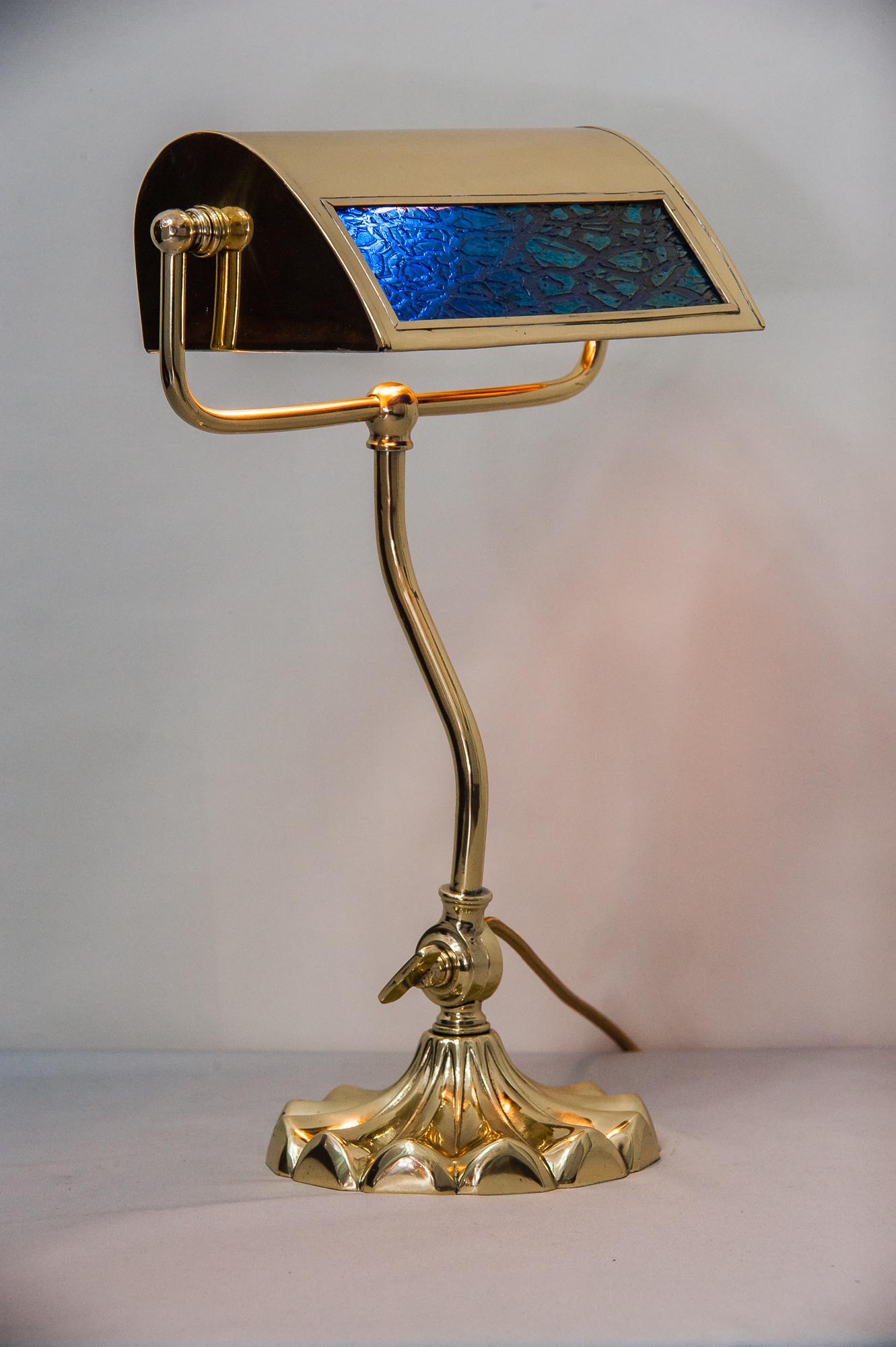 Jugendstil table lamp circa 1909 with original lötz glass 
Polished and stove enameled.