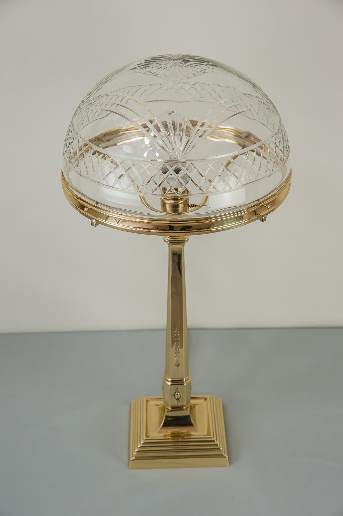 Jugendstil table lamp Vienna, 1909 with original glass shade
Polished and stove enameled.