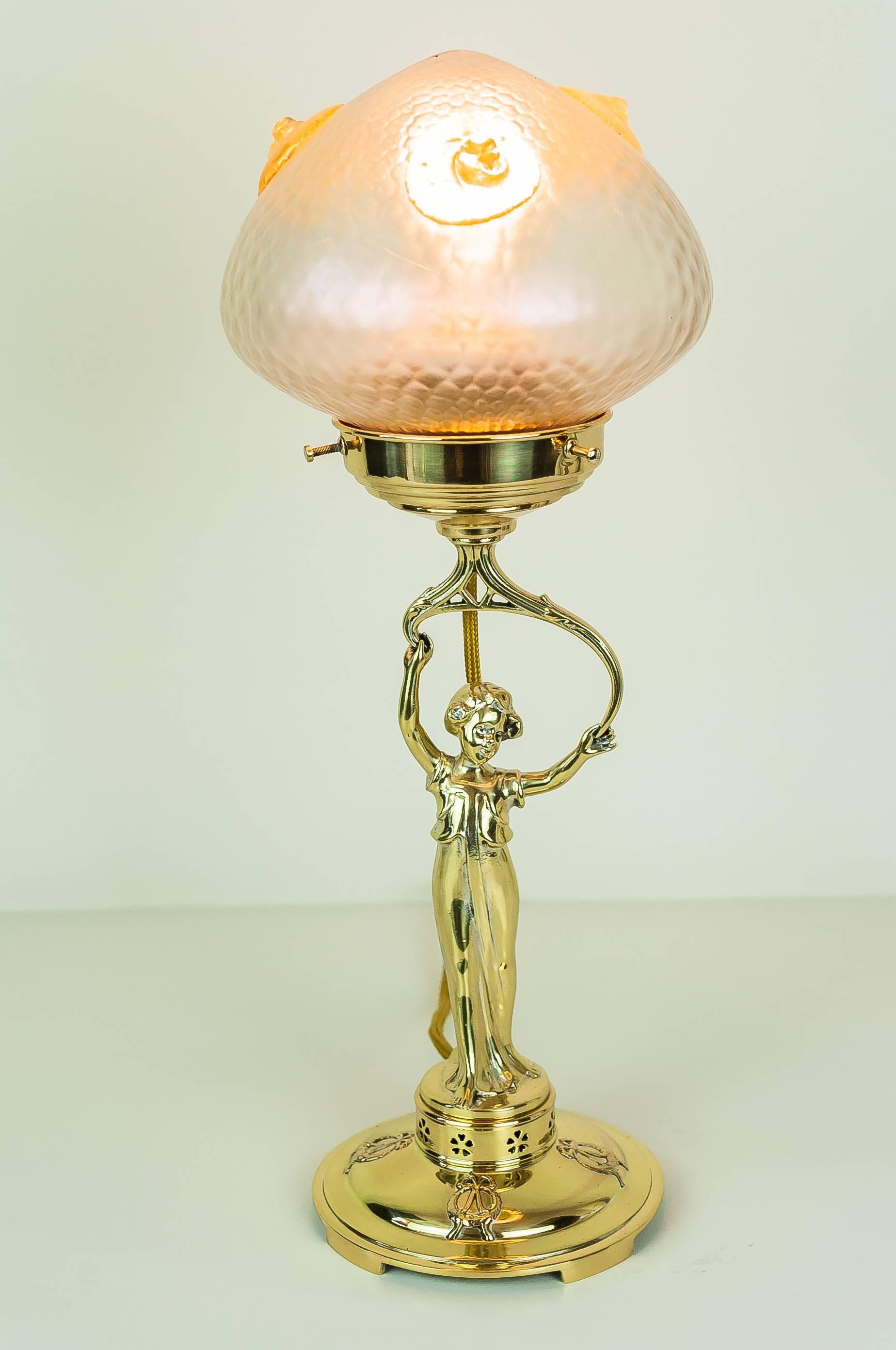 Jugendstil table lamp with Loetz glass shade
Polished and stove enamelled.