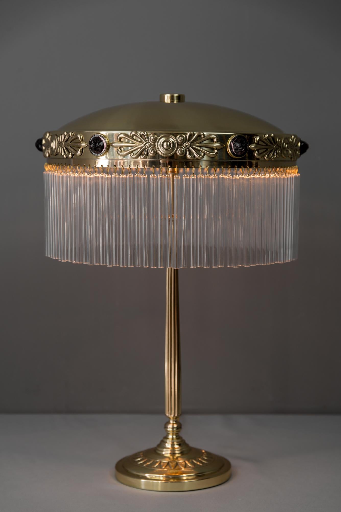Jugendstil table lamp with red opaline stones circa 1908
Polished and stove enameled
Glassticks are replaced (new).