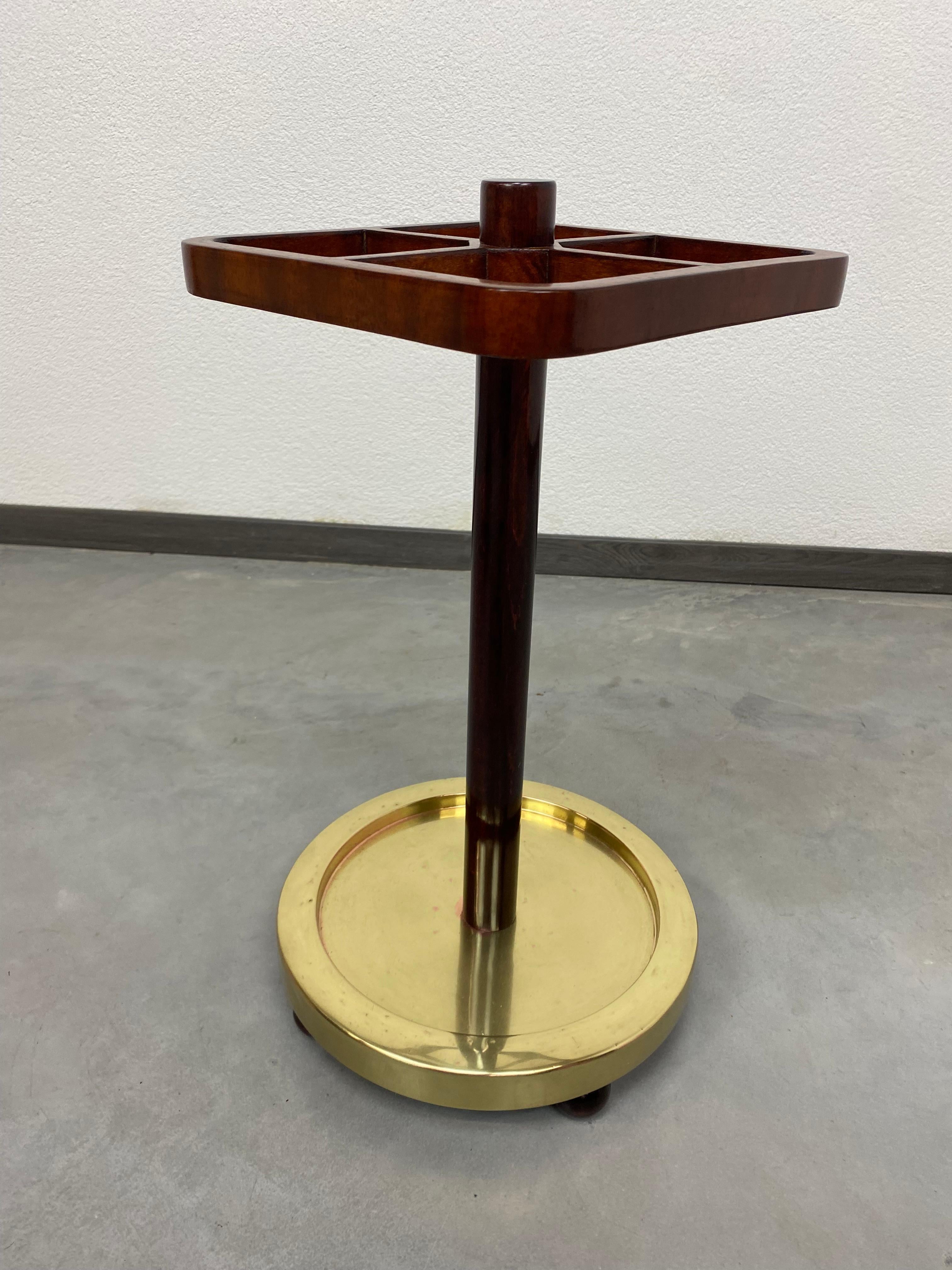 Jugendstil umbrella stand with brass base, professionally stained and repolished.