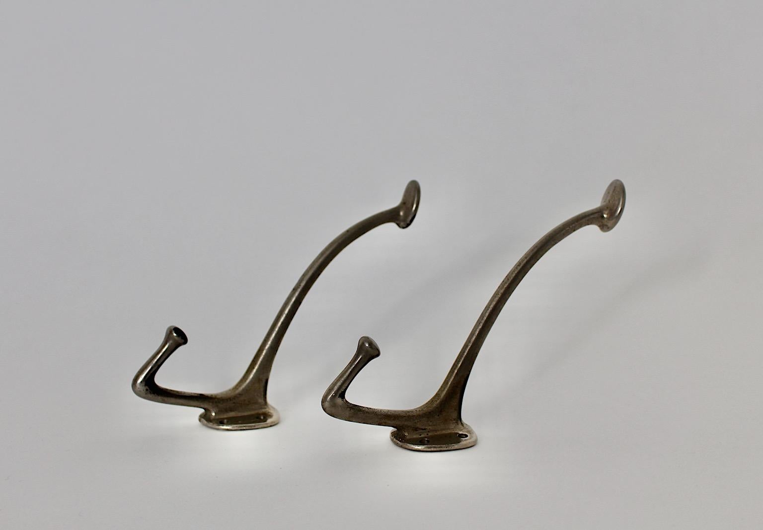 Jugendstil vintage pair of wall hooks or coat hooks by Adolf Loos from nickel plated metal circa 1916 Vienna.
A wonderful pair of coat hooks from nickel plated metal by Adolf Loos circa 1916, Vienna.
The coat hooks are easy to fix. 
These coat
