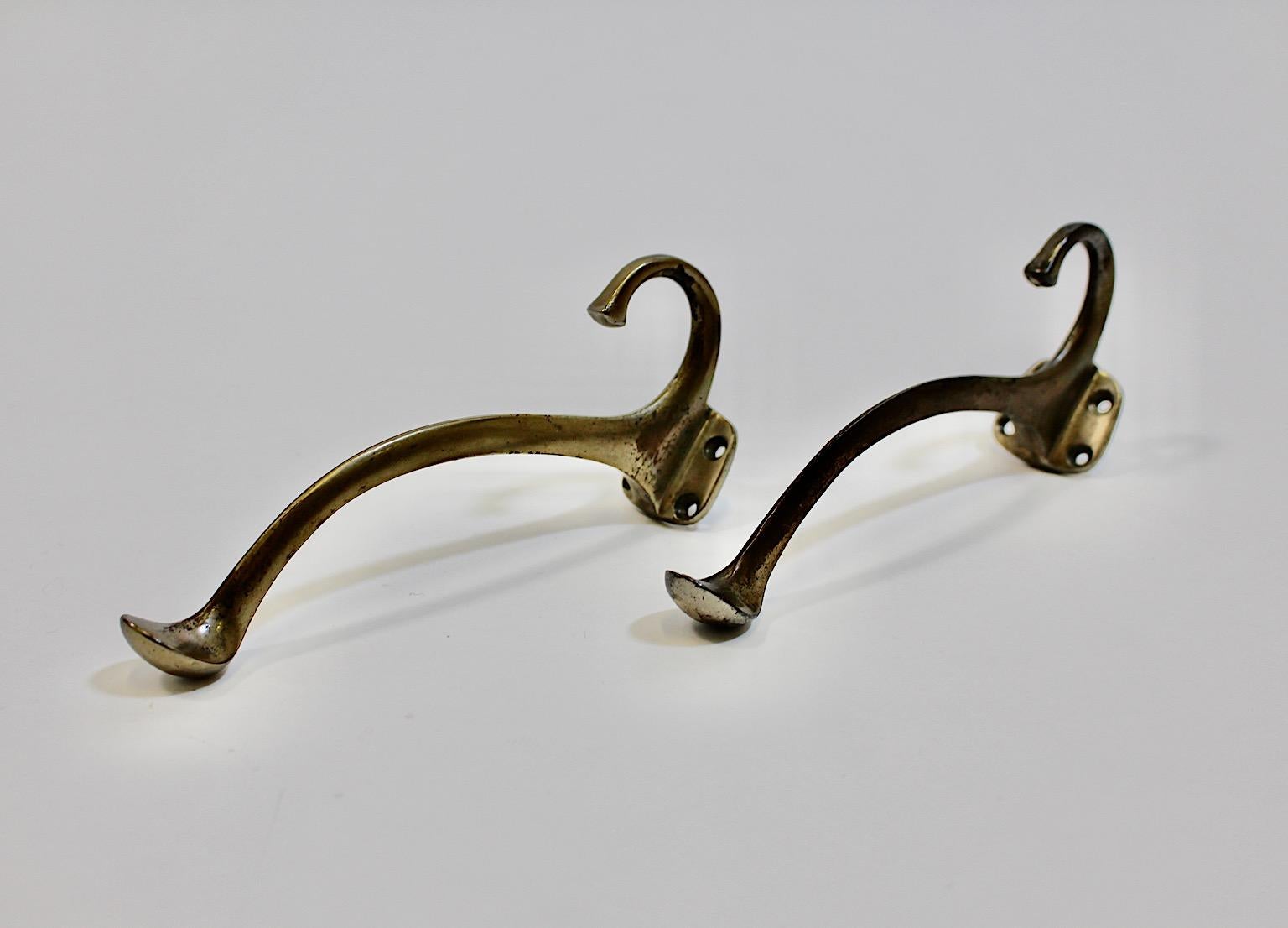 Jugendstil vintage pair of coat hooks duo coat hooks from nickel plated metal circa 1915 Vienna.
An amazing and elegant duo or pair of coat hooks from nickel plated metal slightly curved circa 1915 Vienna.
These wall mounted hooks are easy to