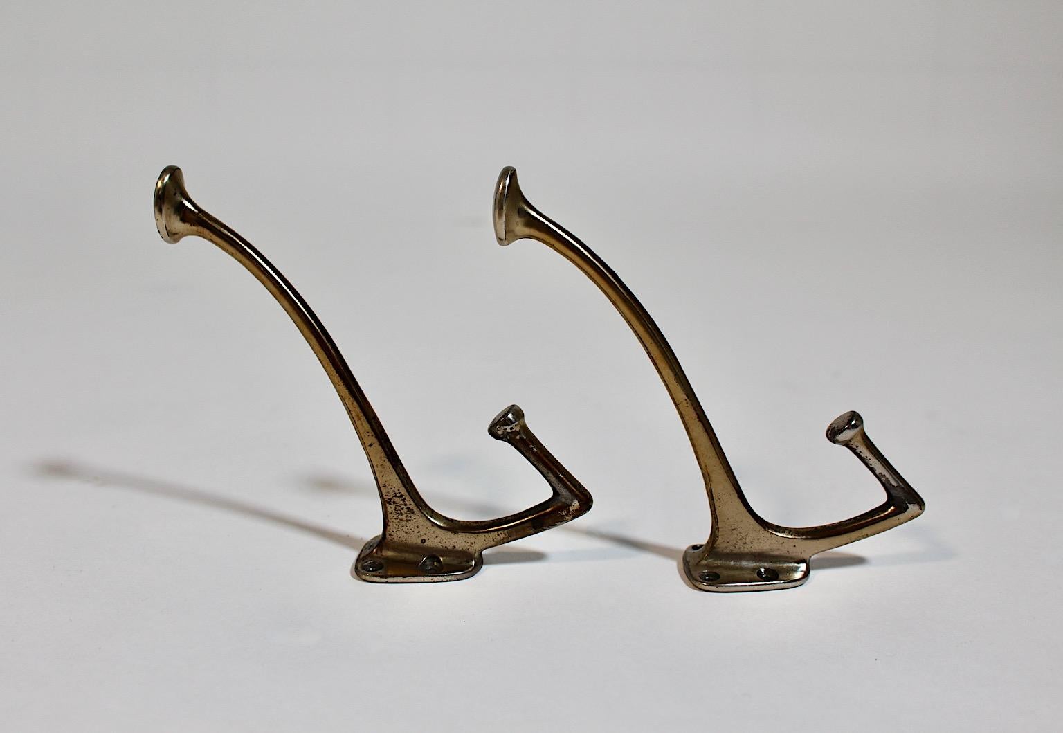 Jugendstil vintage duo or pair of coat hooks wall hooks nickel plated designed by Adolf Loos circa 1916 Vienna.
A stunning pair of vintage wall coat hooks from nickel plated metal designed by Adolf Loos for Cafe Capua circa 1916.
These hooks are