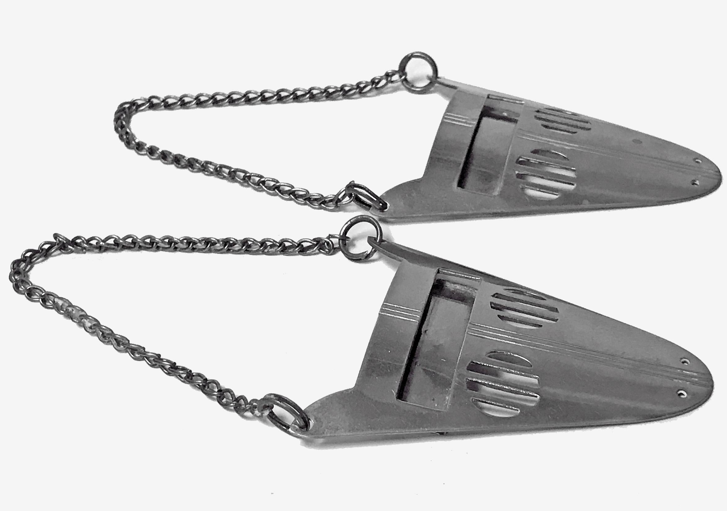 Very rare pair of Jugendstil wine spirit labels, pewter probably WMF, circa 1910. Striking secessionist design, vacant upper panel to allow for particular name of label to be inserted from sides. Running ostrich mark to reverse, original chain