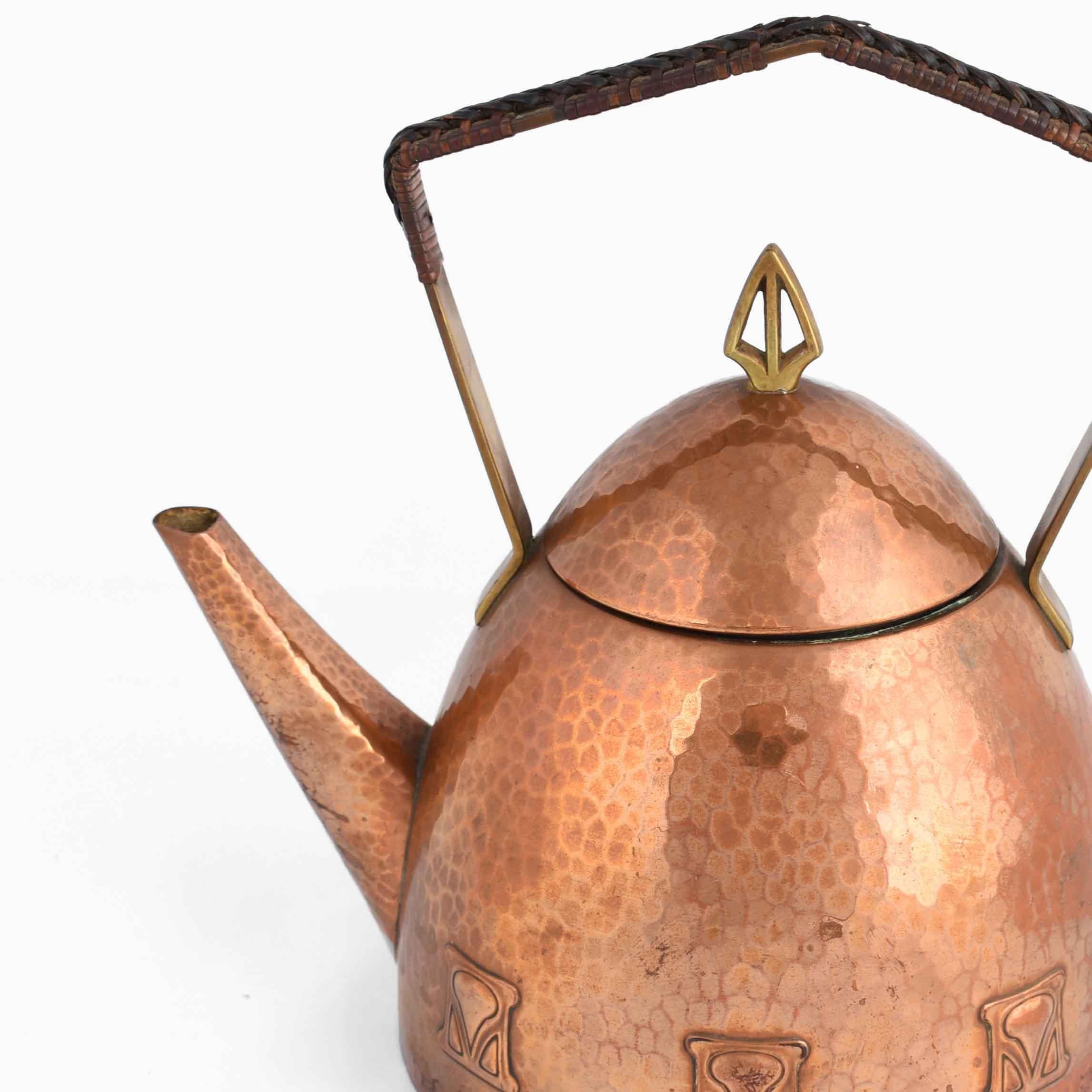Vintage WMF copper and brass teapot is an original decorative object realized by Atelier Mayer in the 1905-1910.

Original copper and brass.

Realized by WMF. Made in Germany.

Good conditions: signs of aging. 

Beautiful metal work realized