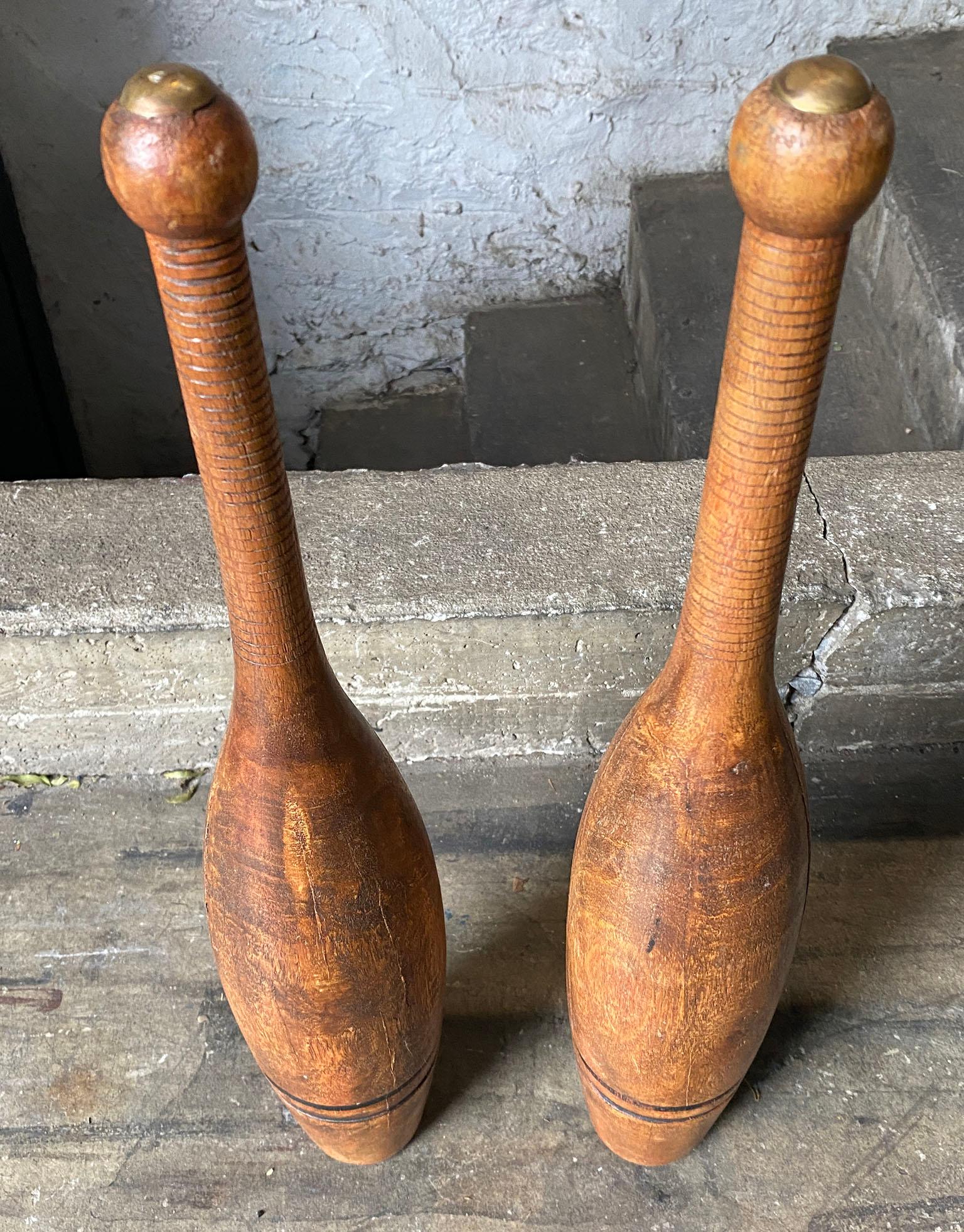 20th Century Juggling Pin Pair of Hand Turned Wooden with Brass Cap