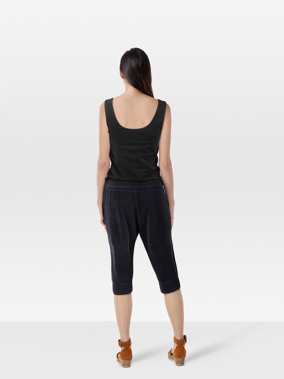 CONDITION is Very good. Minimal wear to the jumpsuit is evident. Loose stitching under both armpits on this used Juicy Couture designer resale item.
 
 Details
 
 
 Black & Navy 
 
 Synthetic
 
 Jumpsuit
 
 Sleeveless
 
 Cropped
 
 Velvet texture
