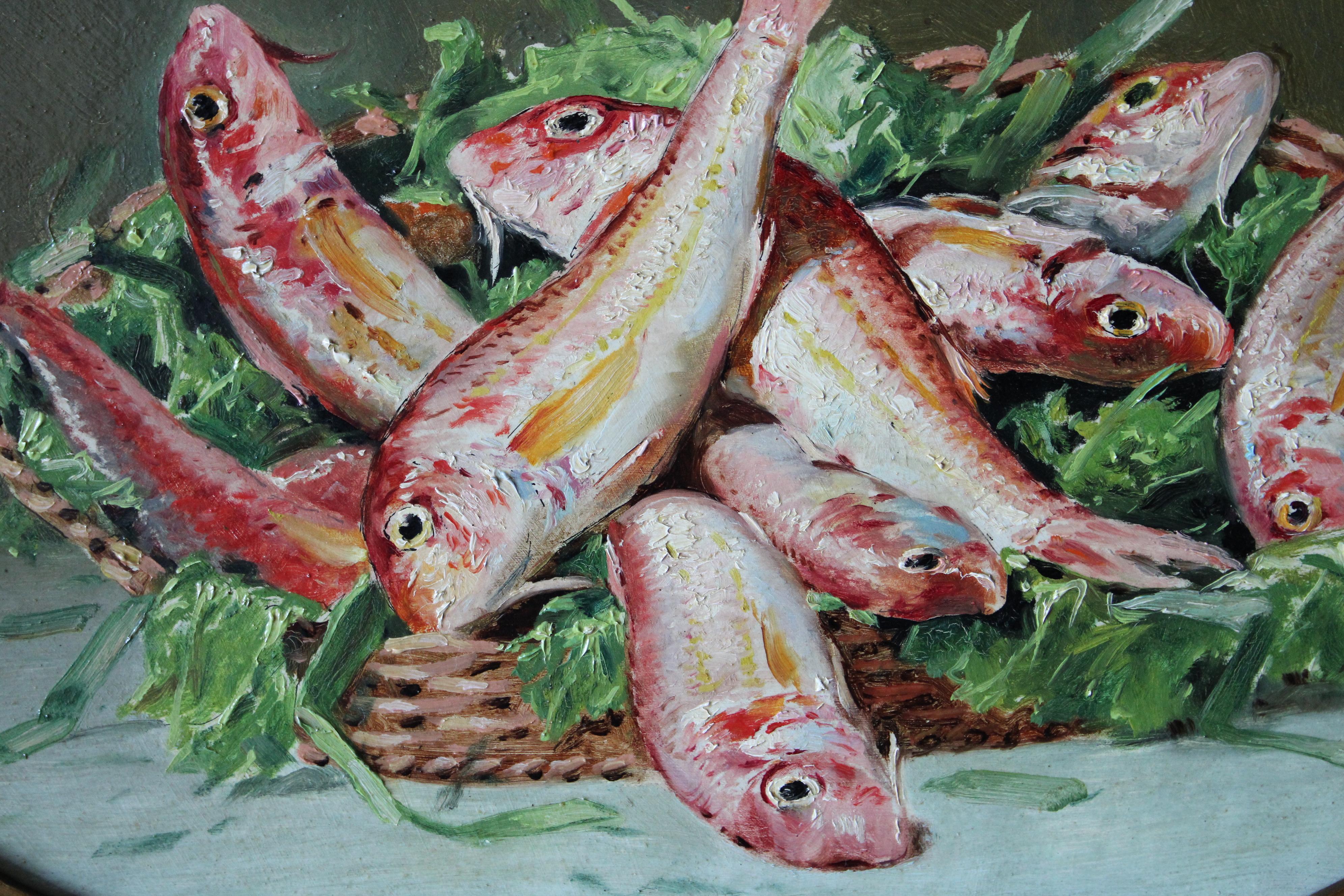 Rare 19th Century Antique French Still Life of fish on wood board in an oval frame by Jules Coulange-Lautrec (1861-1950).  This original oil painting is signed on the left.  Beautifully fresh red mullet spill out of a wicker basket to give the