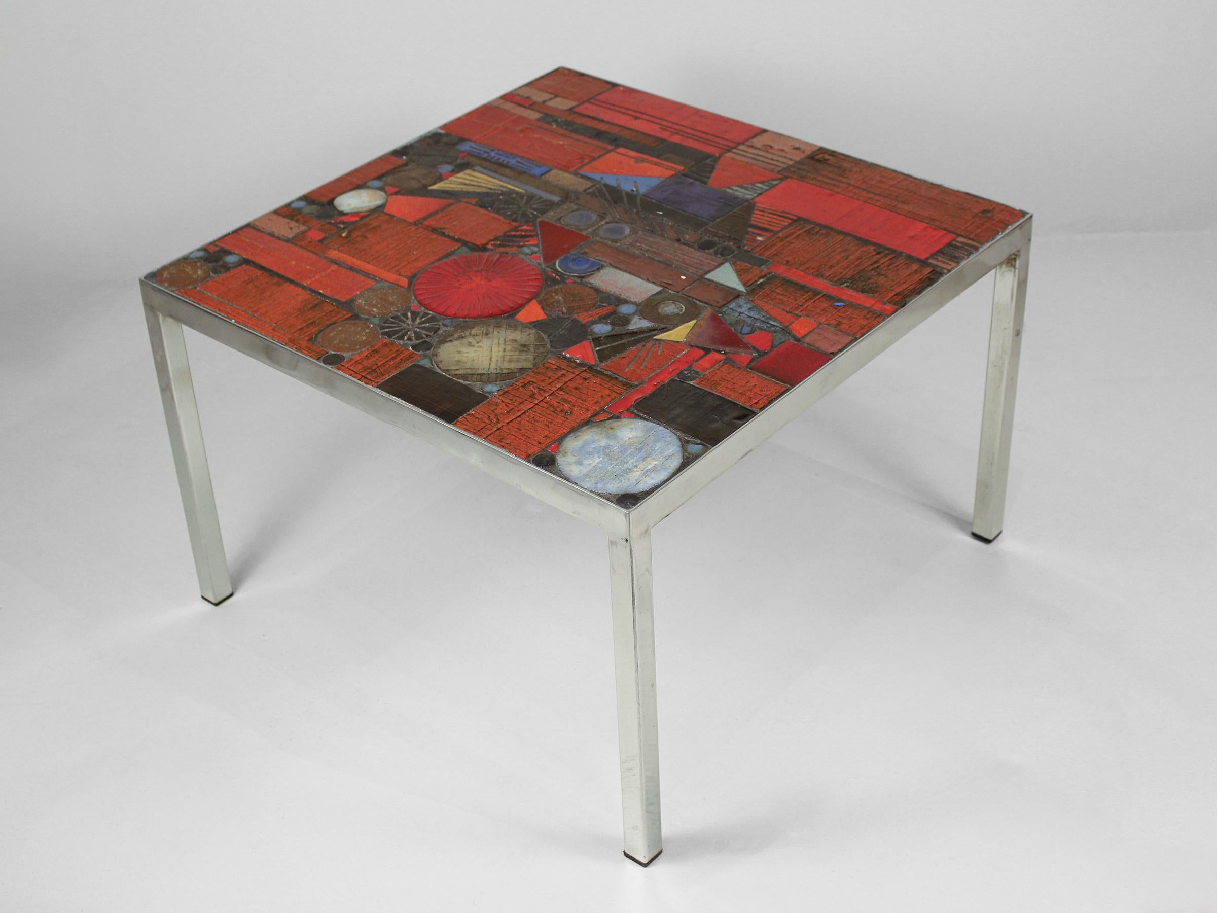 This piece presents a striking statement that fuses Brutalism and Modernism. Belgian designer, Jules Dewaele, created this vibrant ceramic table at his workshop Pia Manu (“a creative hand”). Dewaele had begun the 1960s working at Rogier Vandeweghe’s