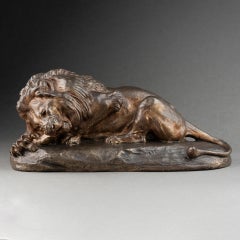 Jules Edmond Masson : "Reclining Lion, gnawing a Bone", bronze sculpture C.