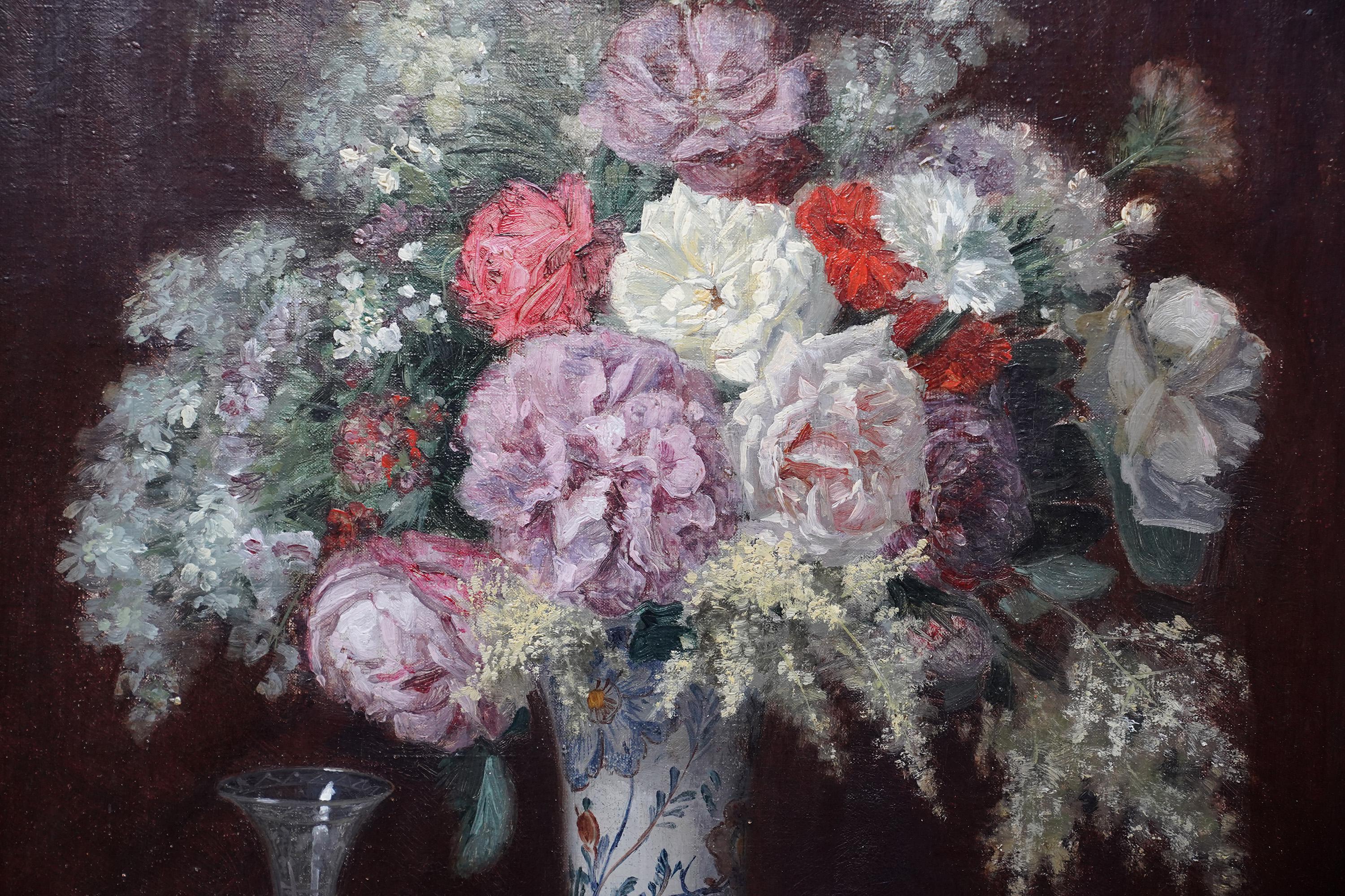 This superb Victorian oil painting is by French artist Jules Etienne Carot. Painted in 1884 it is a mixed floral of mainly white flowers, including lilac and roses, which stand out beautifully against a dark background. The bouquet  is arranged in a