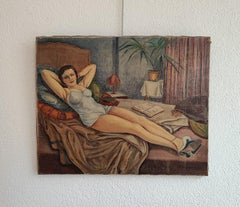 Young woman in nightie lying on the bed