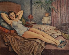 Young woman in nightie lying on the bed
